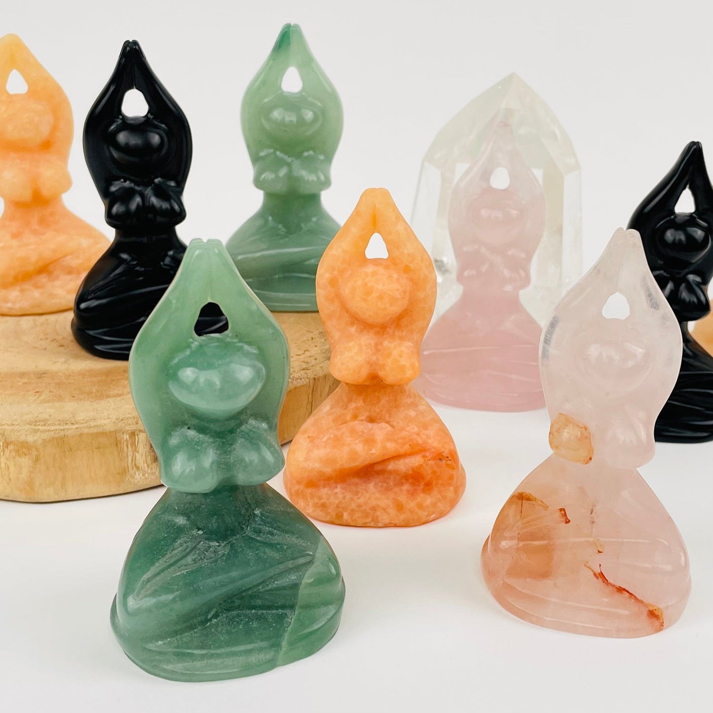 multiple gemstone goddesses displayed to show the differences in the color shades