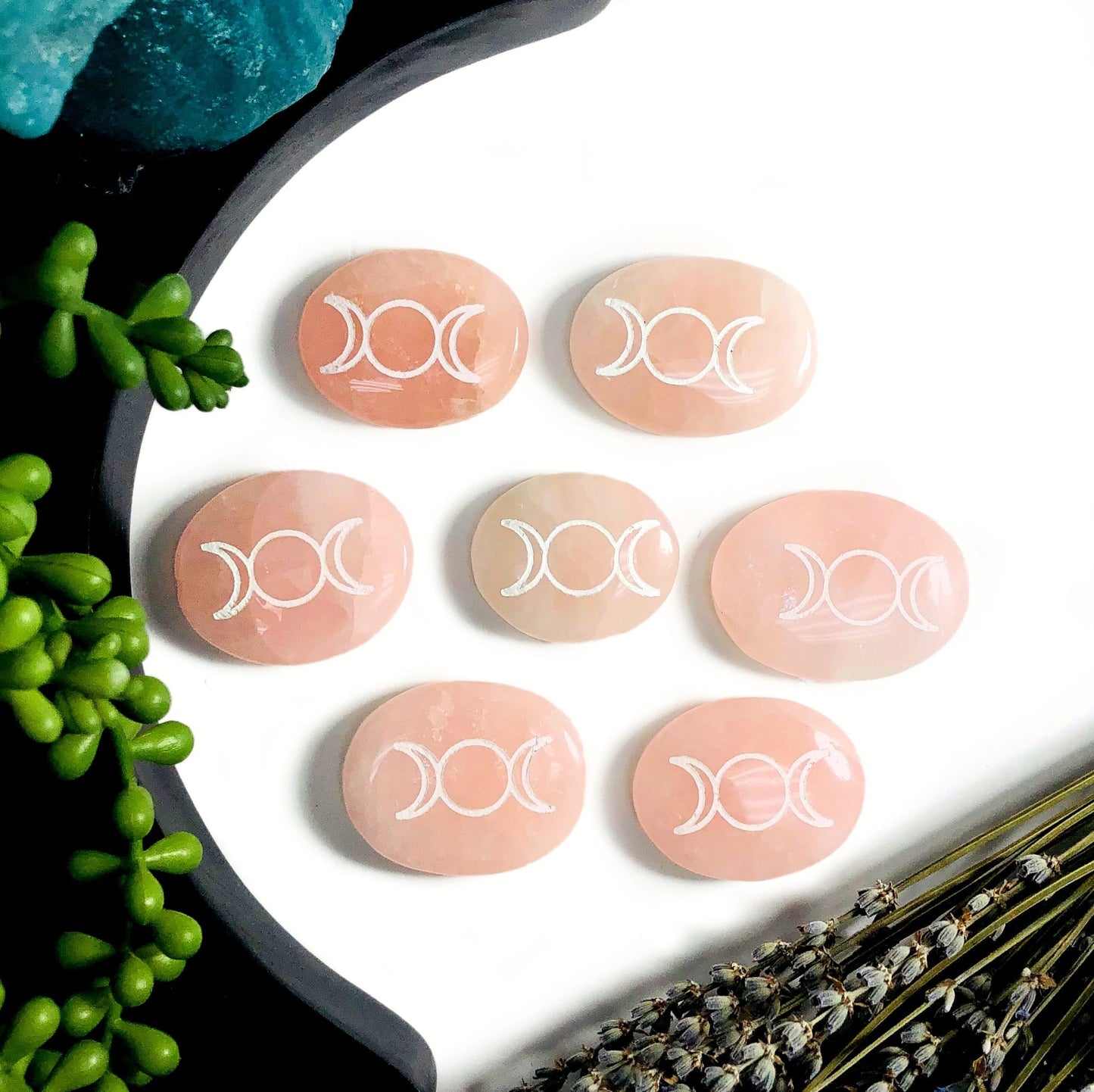 Multiple Rose Quartz Palm Stones Pocket Stones with Moon Phase in white background