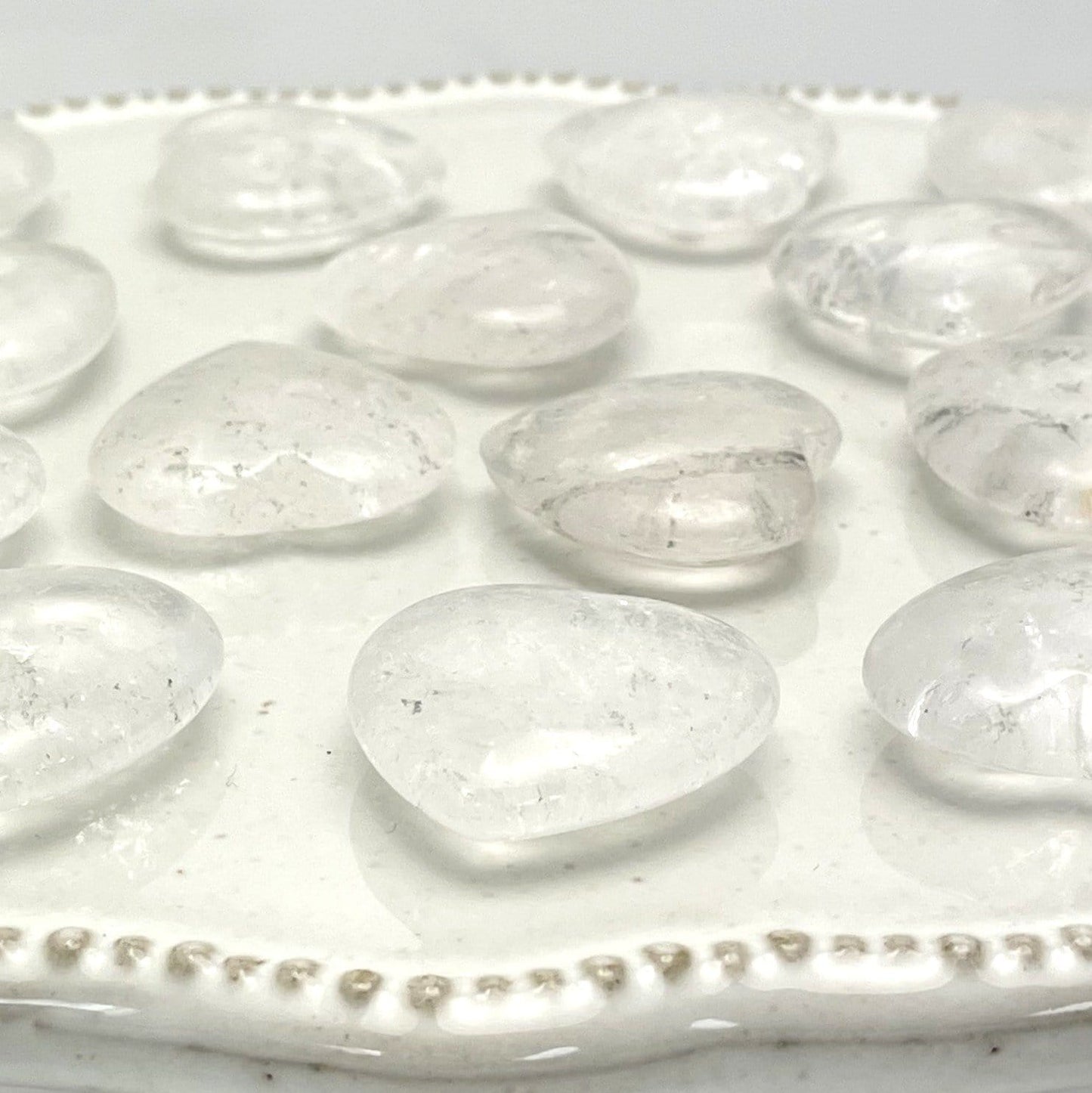 side view of crystal quartz hearts to show thickness