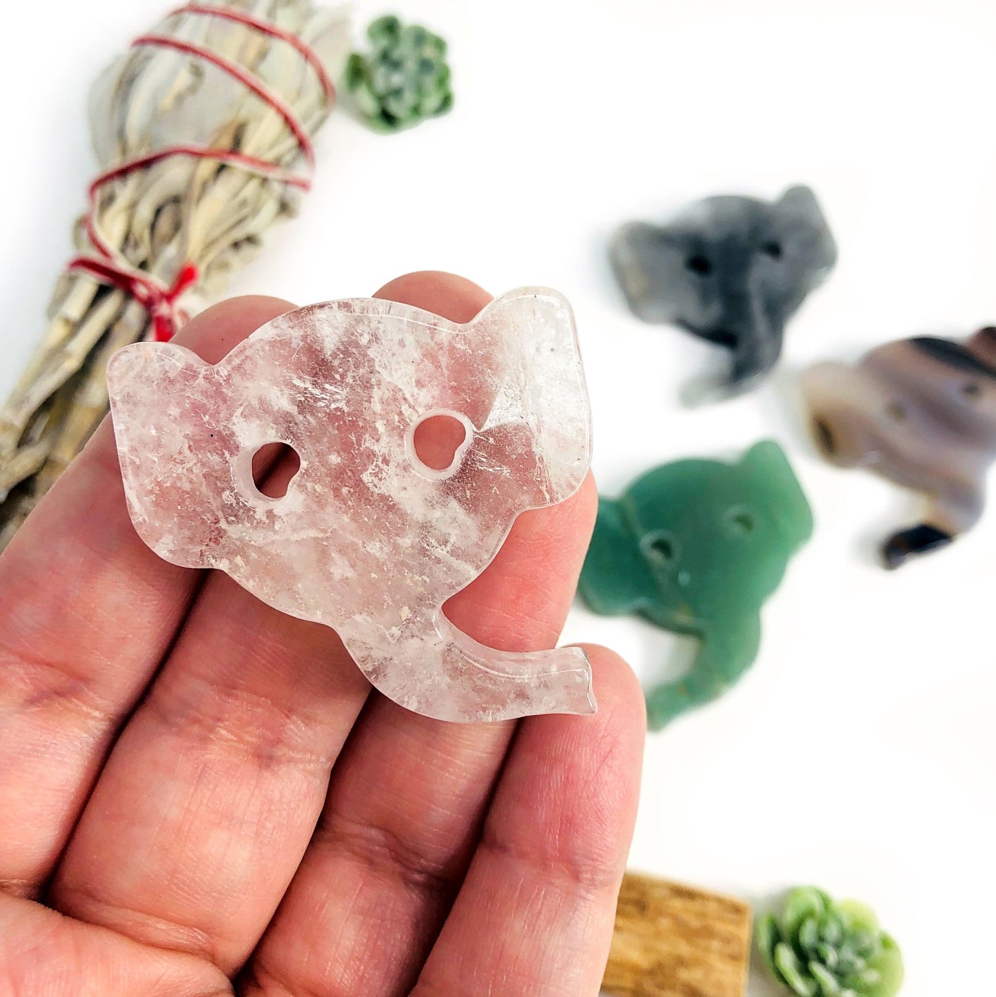 Elephant Gemstone Cabochons on a ahand