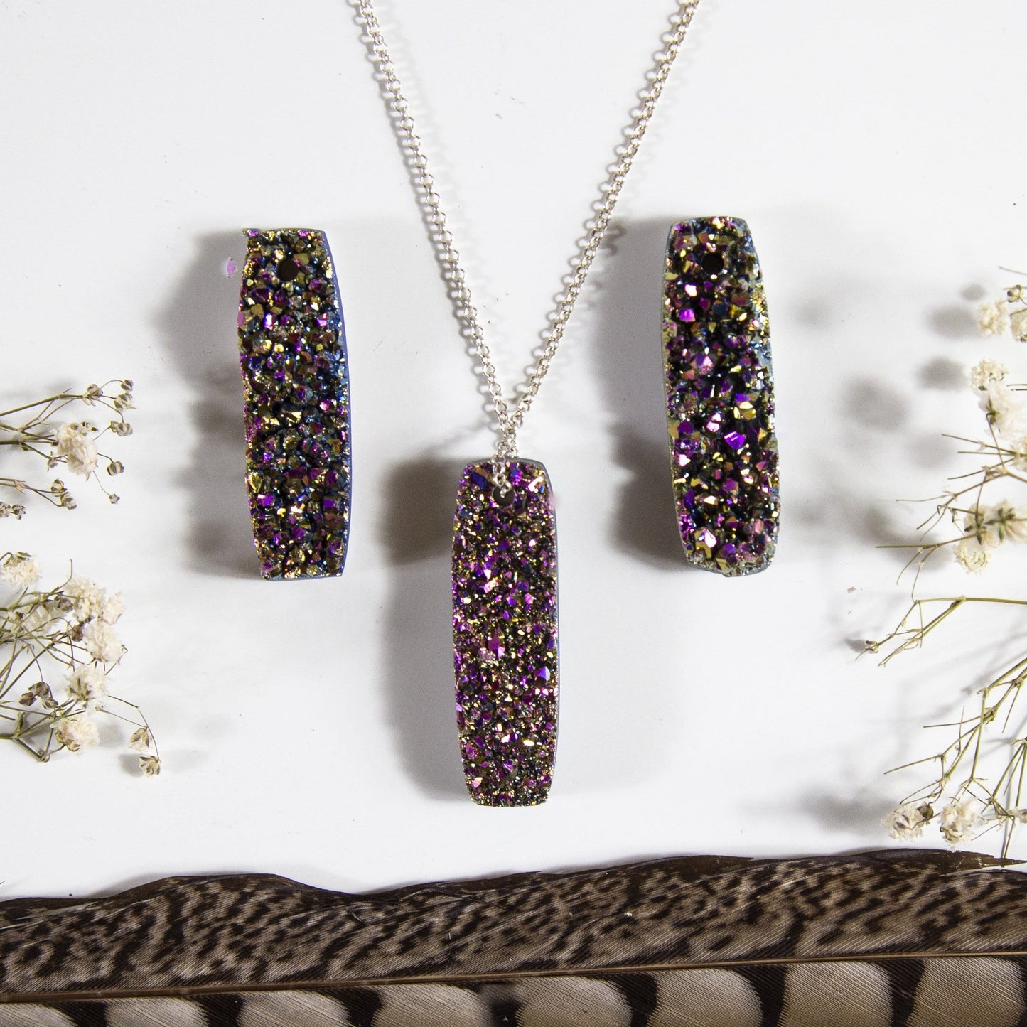 druzy drilled bead with decorations in the background