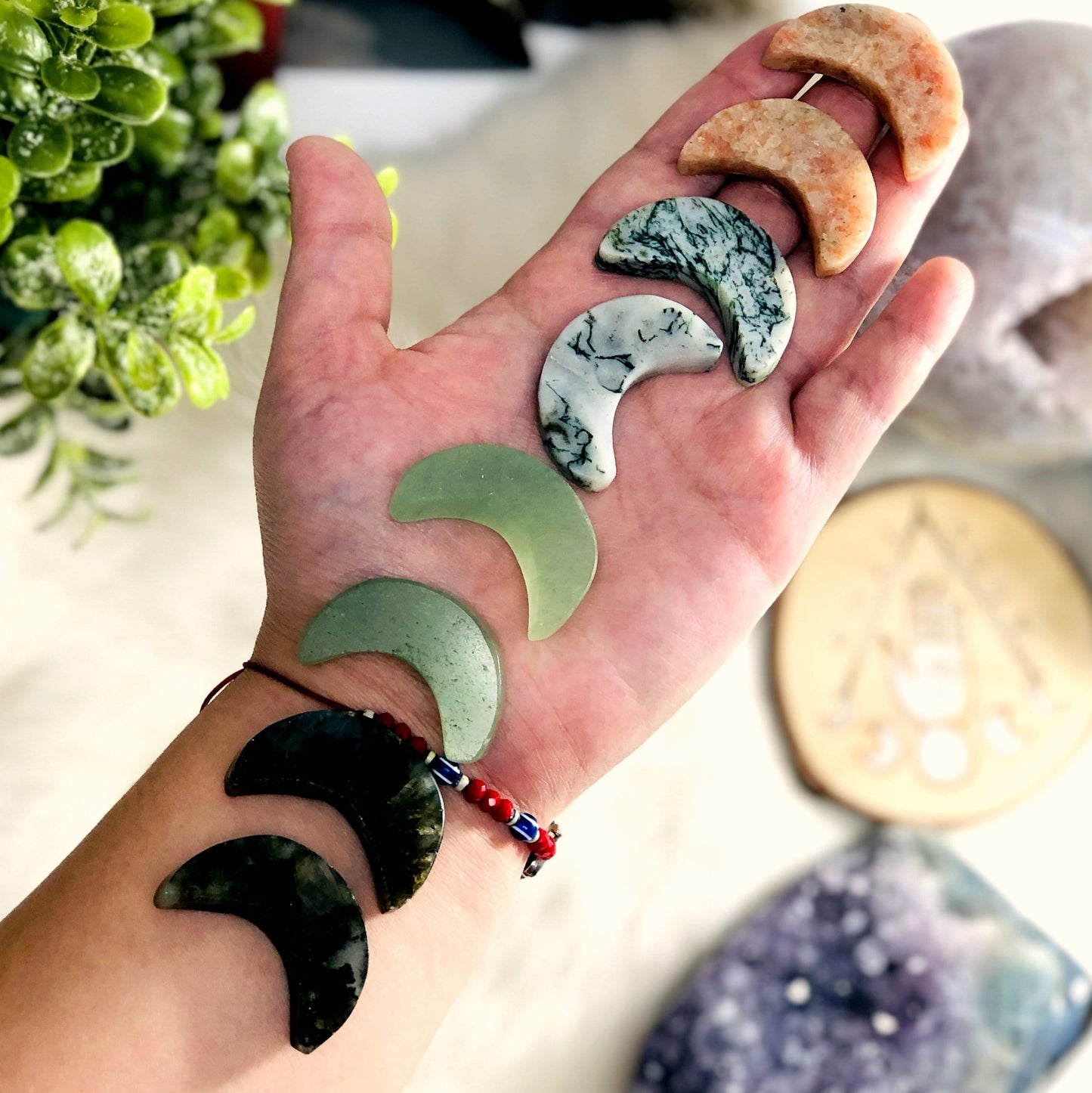 Gemstone Moon Phase shape Moss Agate Half Labradorite Half Sunstone Half Aventurine Half Rose Quartz Half Sodalite Half shown on hand for size reference