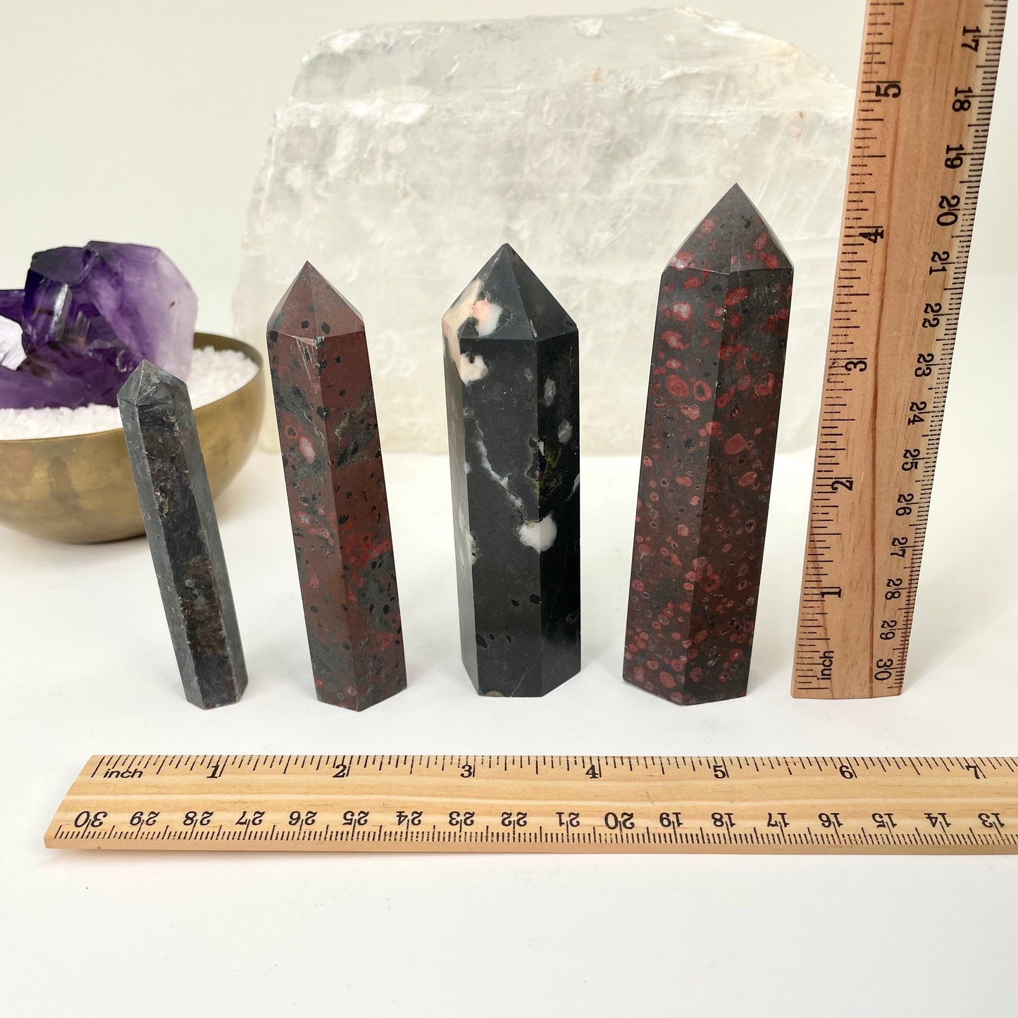 polished points next to a ruler for size reference