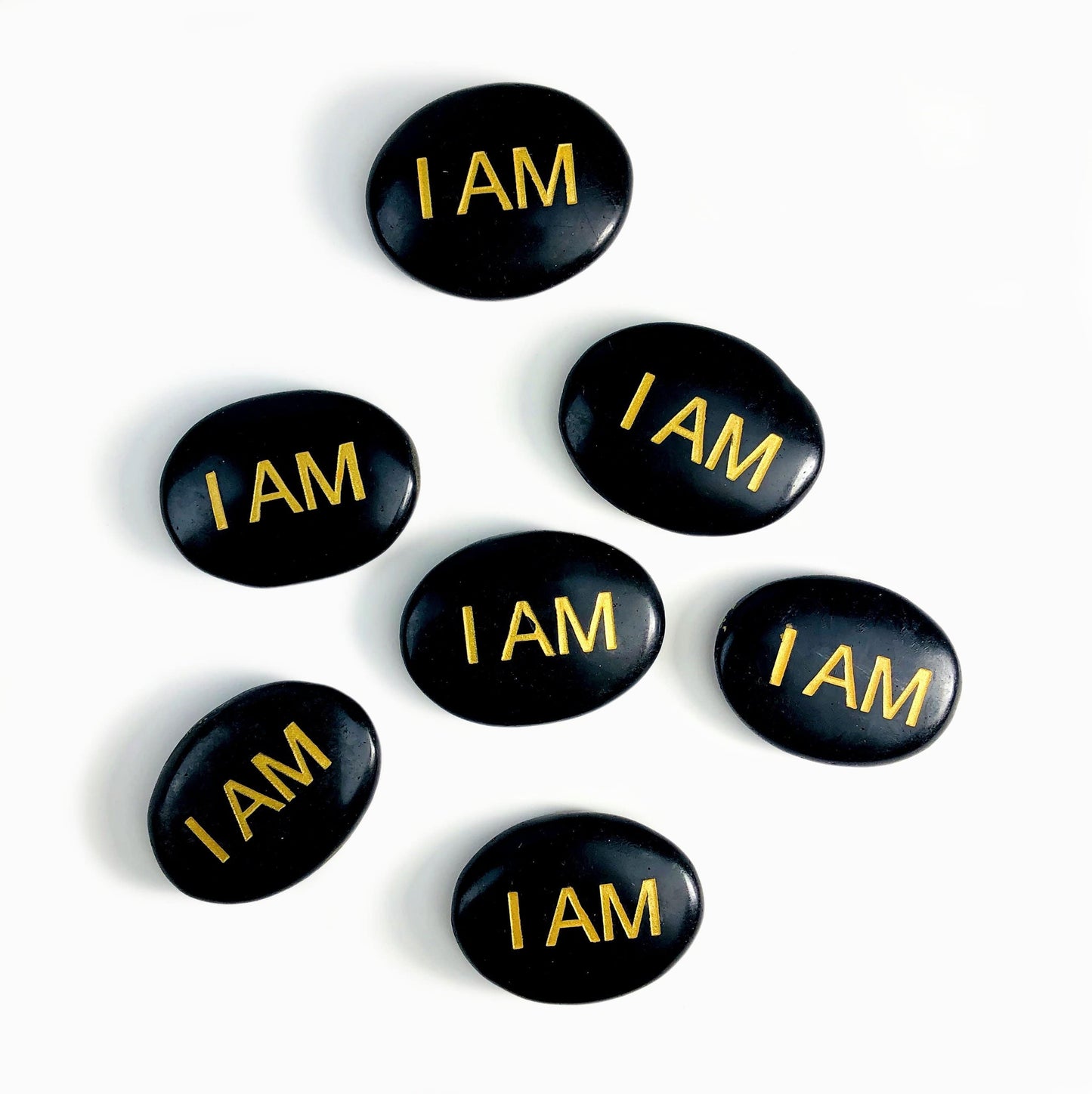 i am obsidian stones on a table