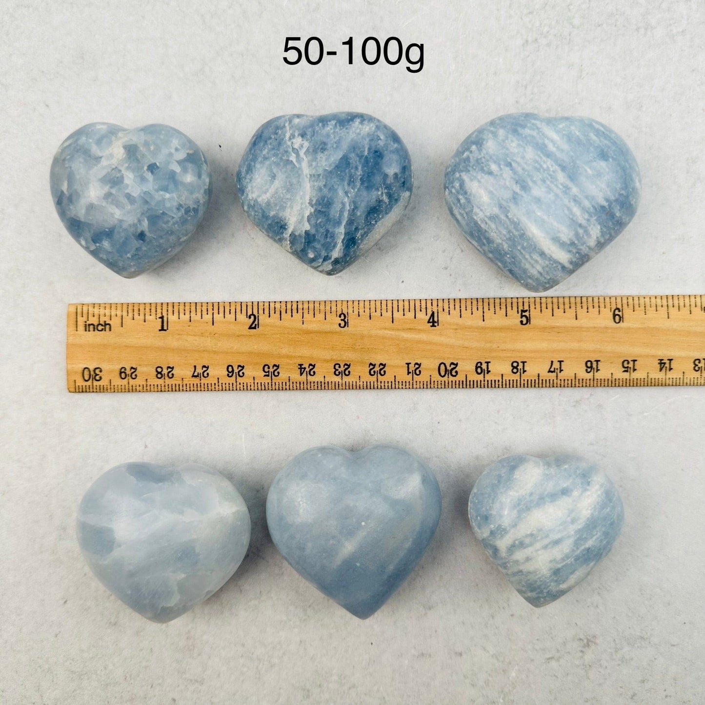Blue Calcite Heart - CHOOSE WEIGHT next to a ruler for size reference