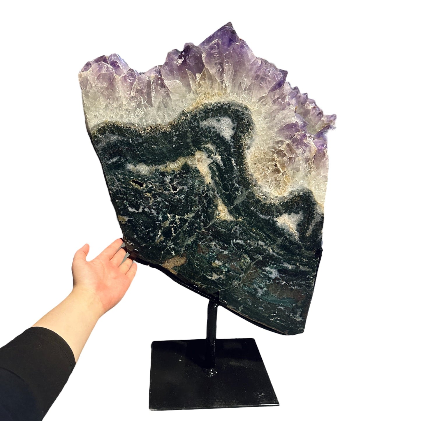 amethyst with jasper on metal stand on white background