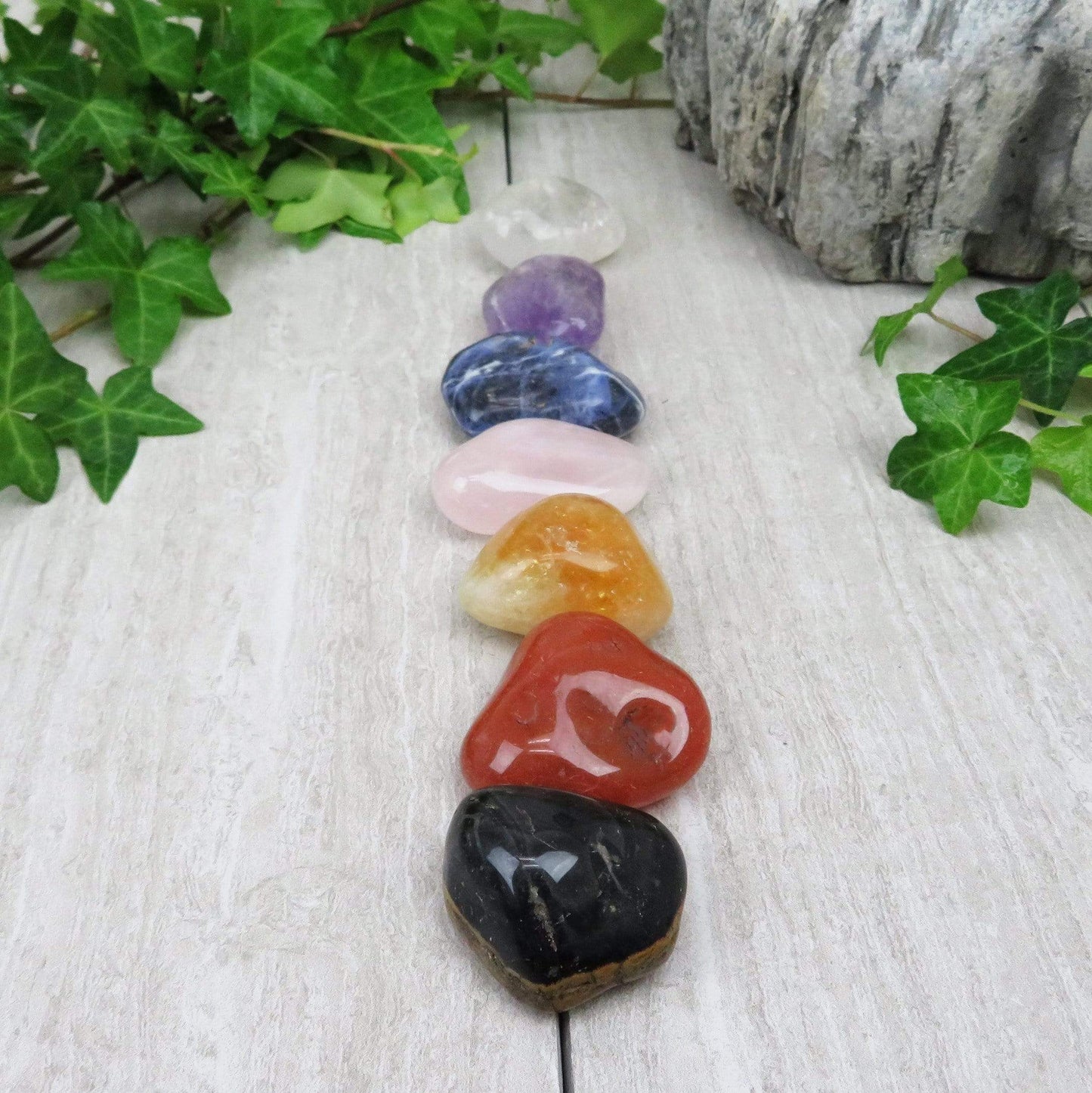 Chakra Stones Set of 7 Tumbled Stones A Quality LARGE stacked in chakra order side view