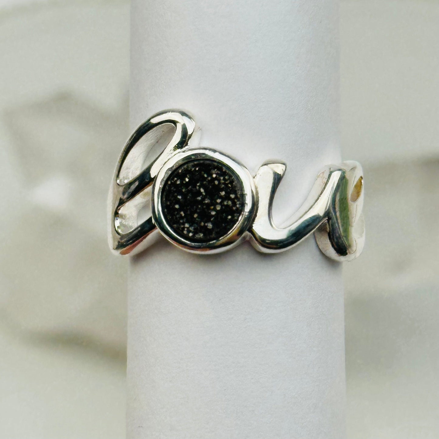 close up of the details on these crytsal rings