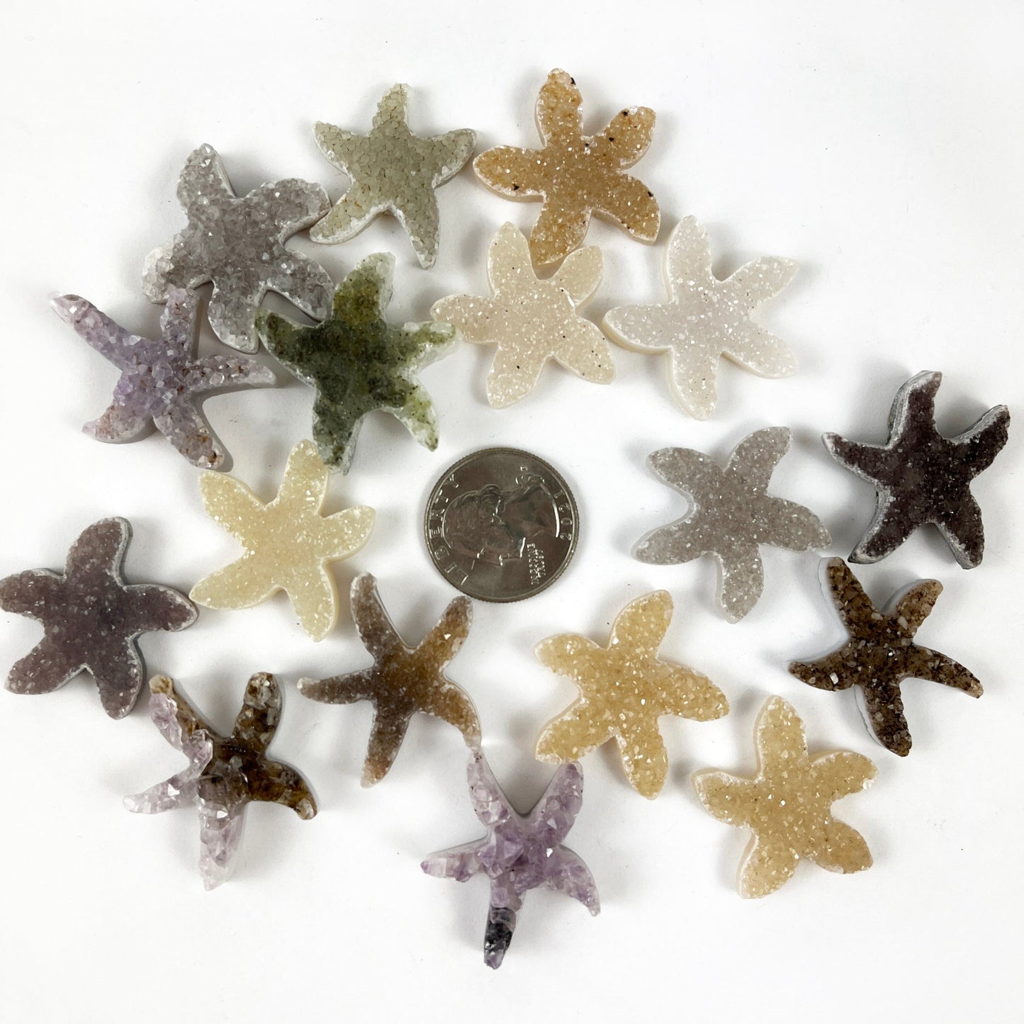 Druzy 30mm Starfish Shaped Cabochons next to a quarter for size reference