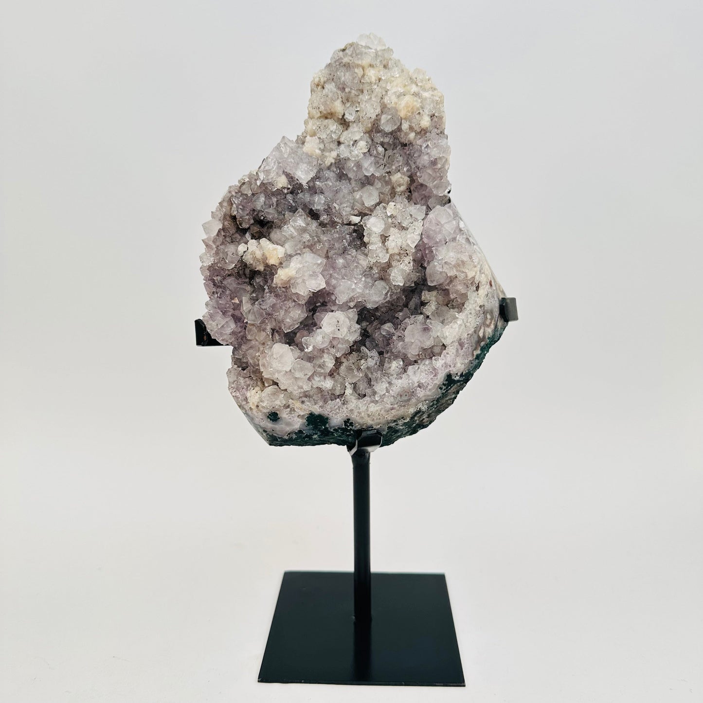 amethyst crystal cluster comes on a metal stand
