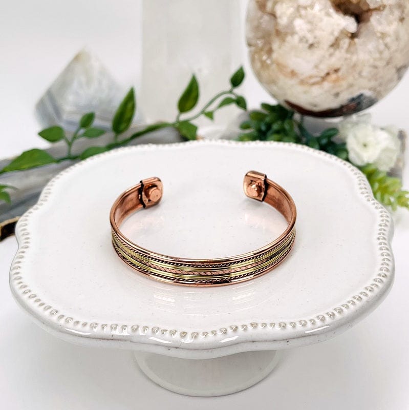close up of the details on this copper bracelet