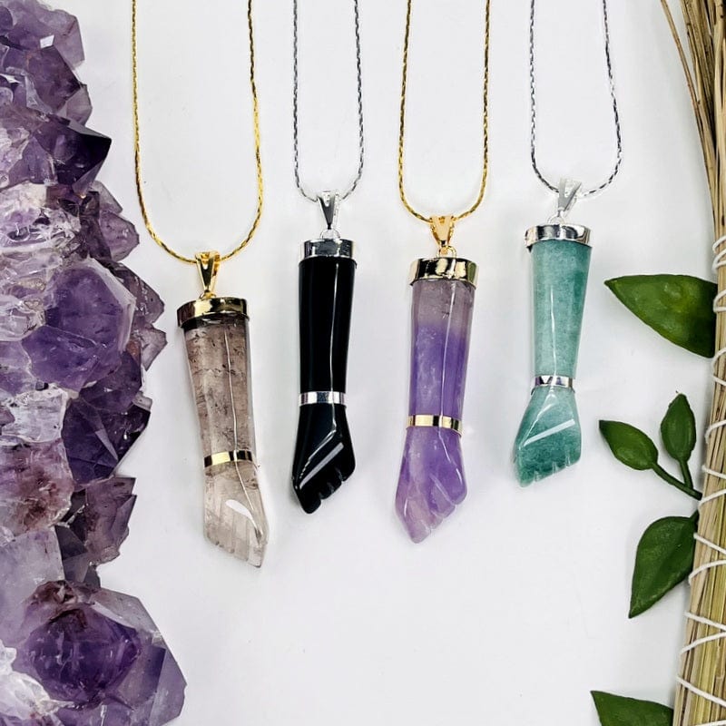 figa hand pendants displayed on chain