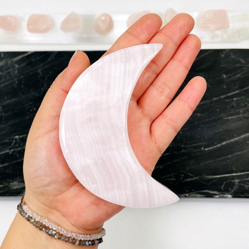 close up of the patterns on the pink calcite moon