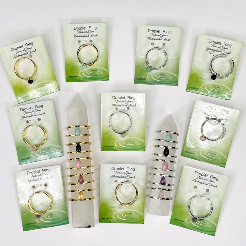 rings displayed to show the differences in the colored gemstones