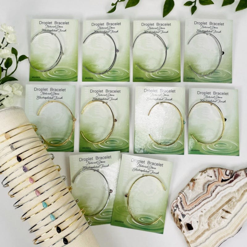 bracelets displayed to show the differences in the gemstone types
