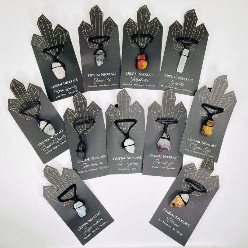 all necklaces displayed on card. the back of the card has some information on each individual crystal