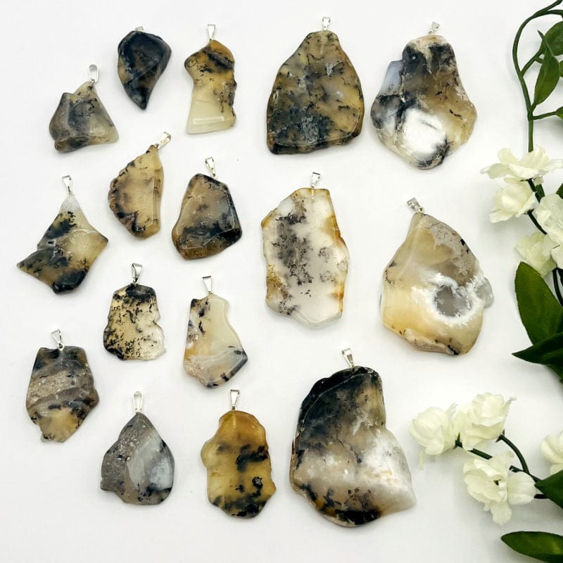 multiple pendents displayed to show the differences in the sizes and color shades
