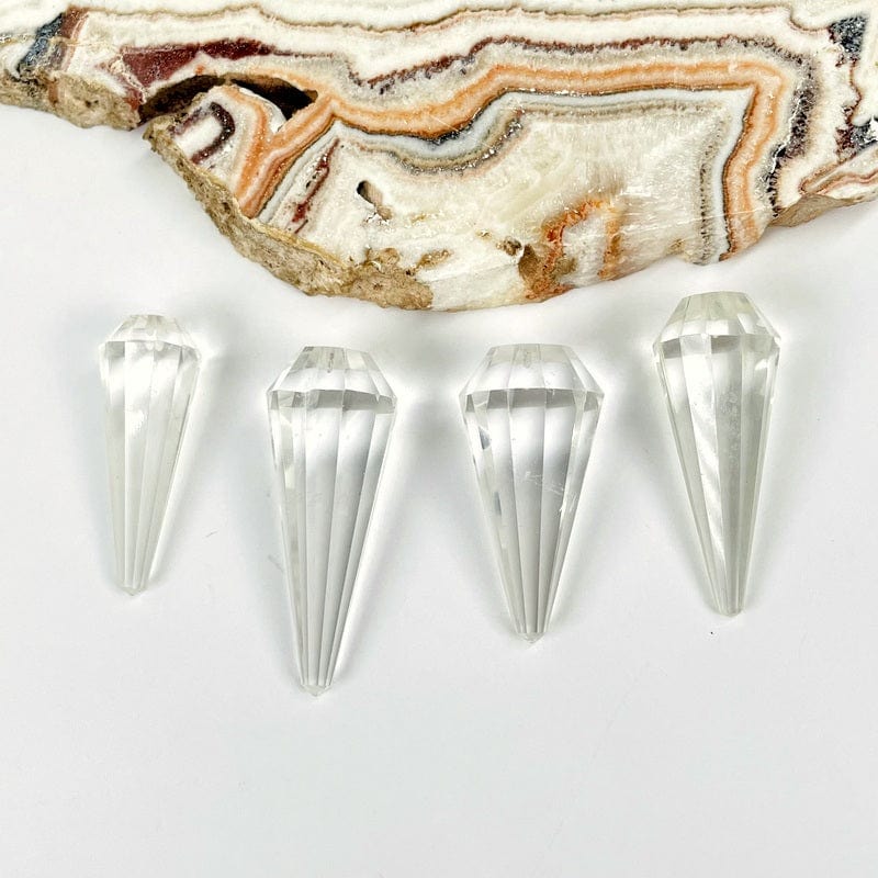 pendulums displayed to show the differences in the sizes