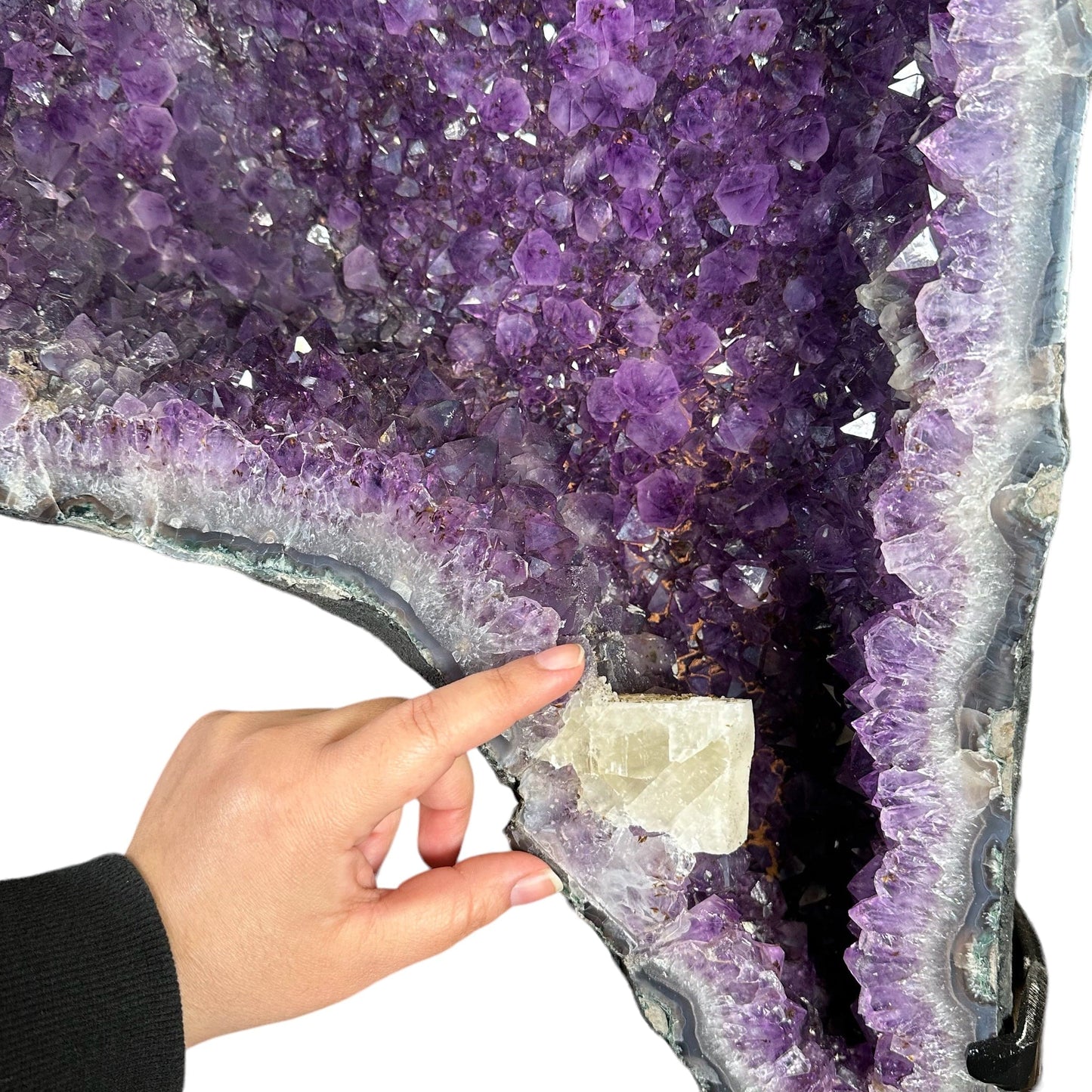 hand next to the calcite formation