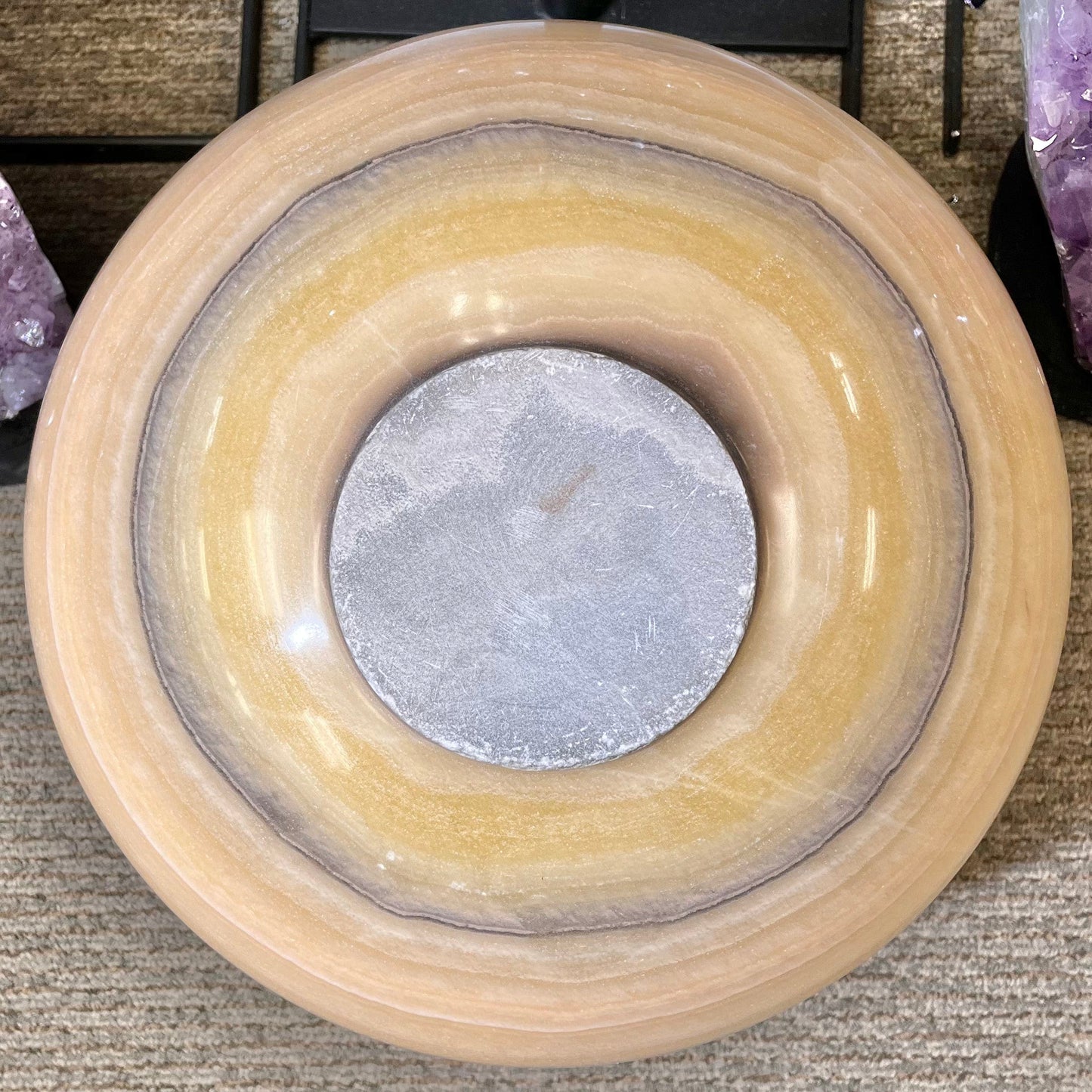Bottom view of Mexican Onyx - Colossal Polished Sphere Option A, showing cut base.