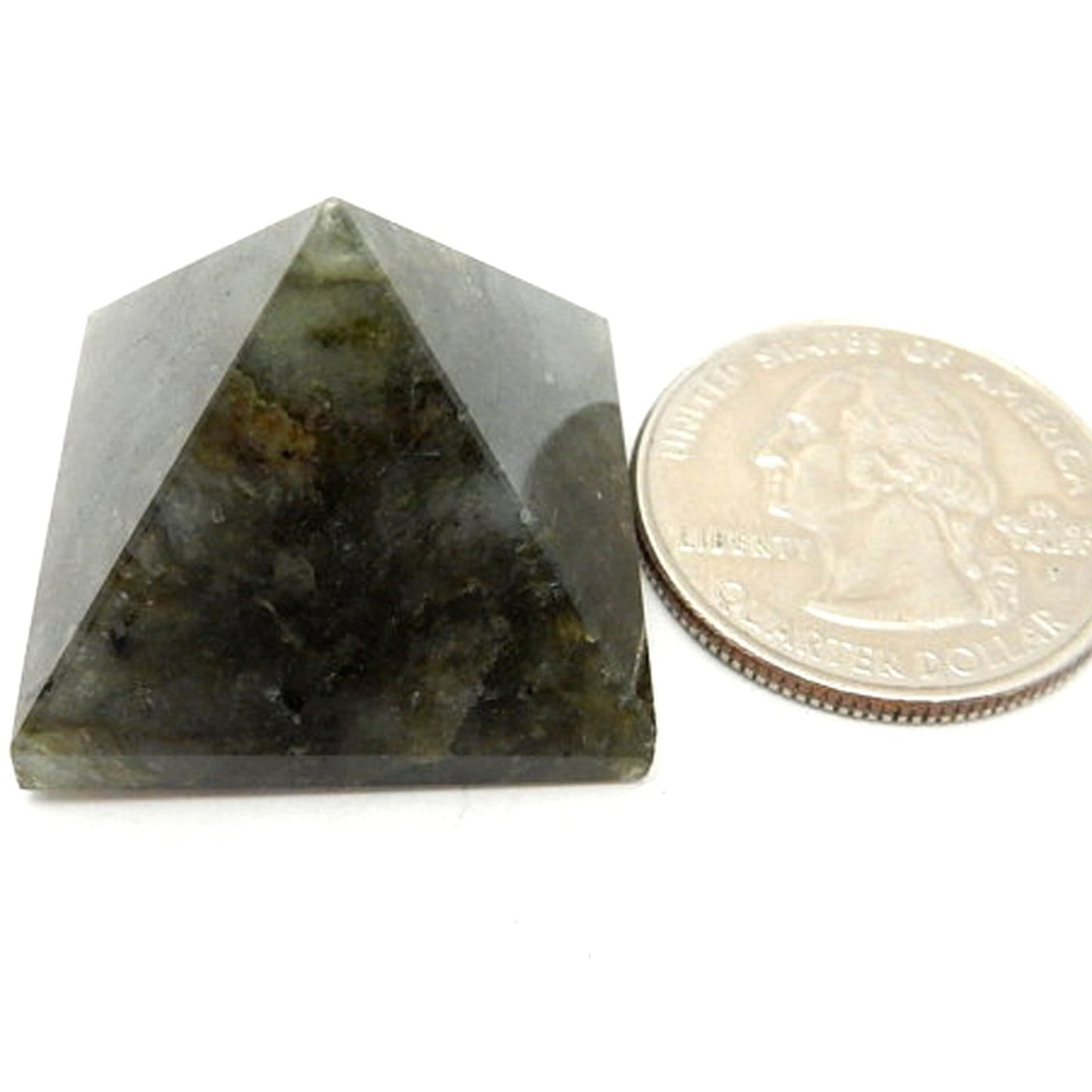 Labradorite Pyramid next to quarter for size comparison