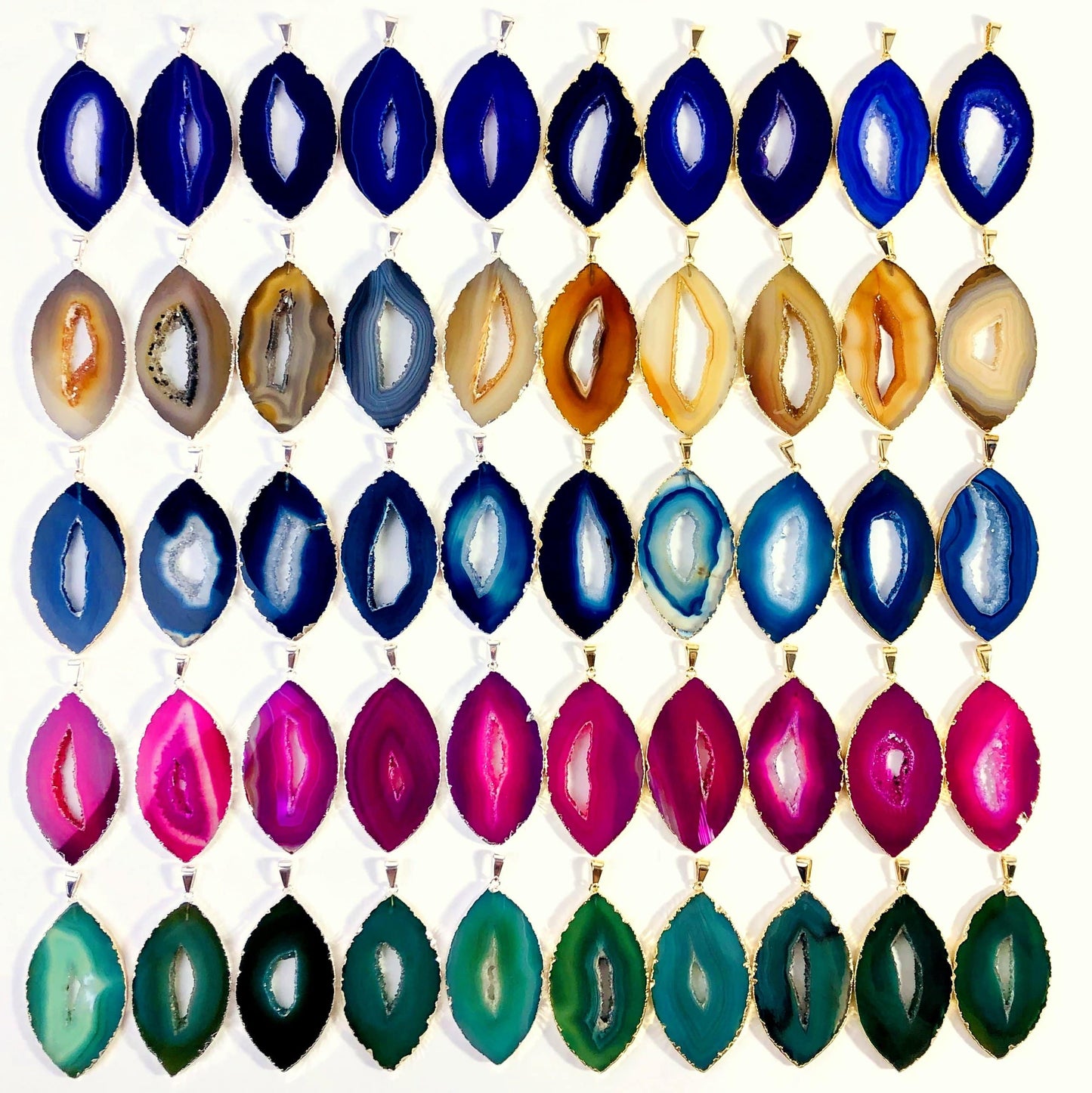 Front facing agate druzy pendant marquise shape to show variety in pattern and color.