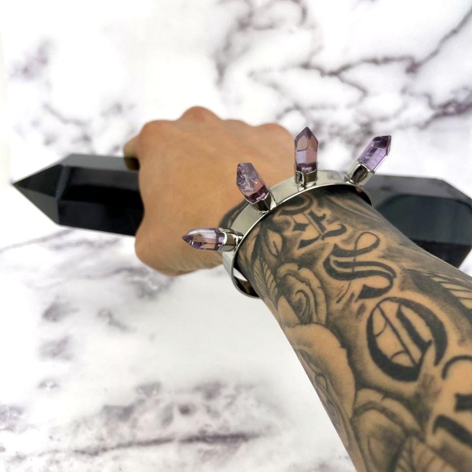 amethyst gemstone spike bracelet displayed on wrist for size reference