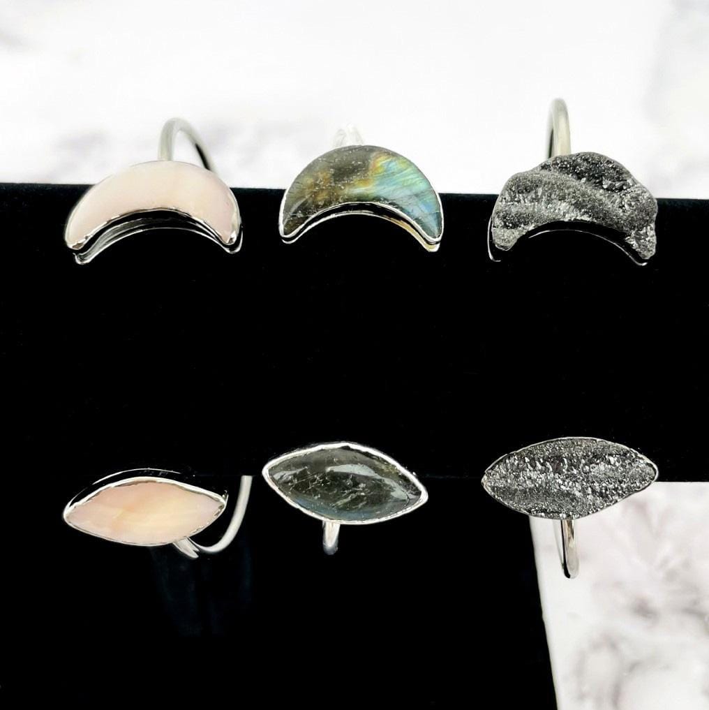 up close details on the crescent moon and marquise to show different characteristics