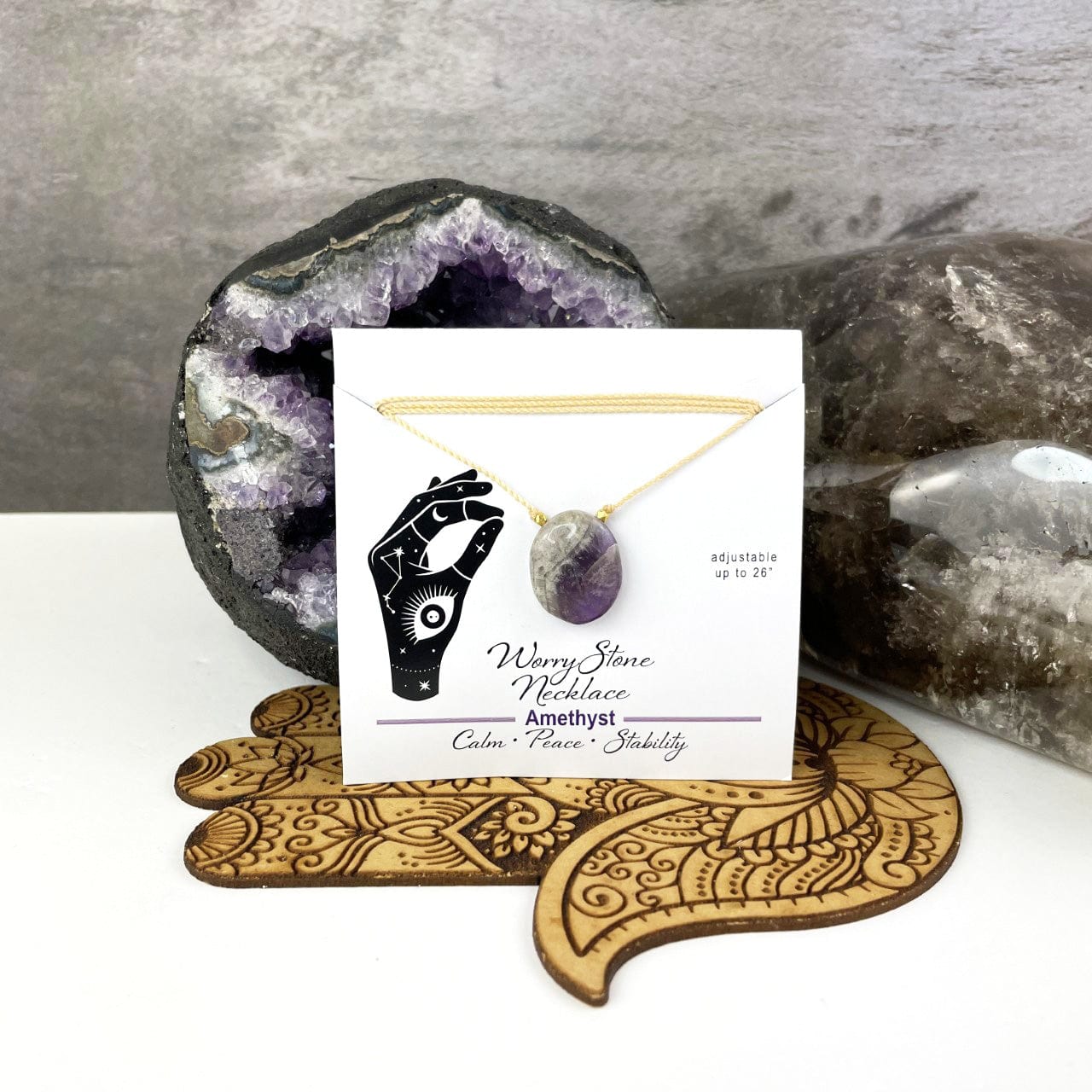 amethyst worry stone necklace, carded for display