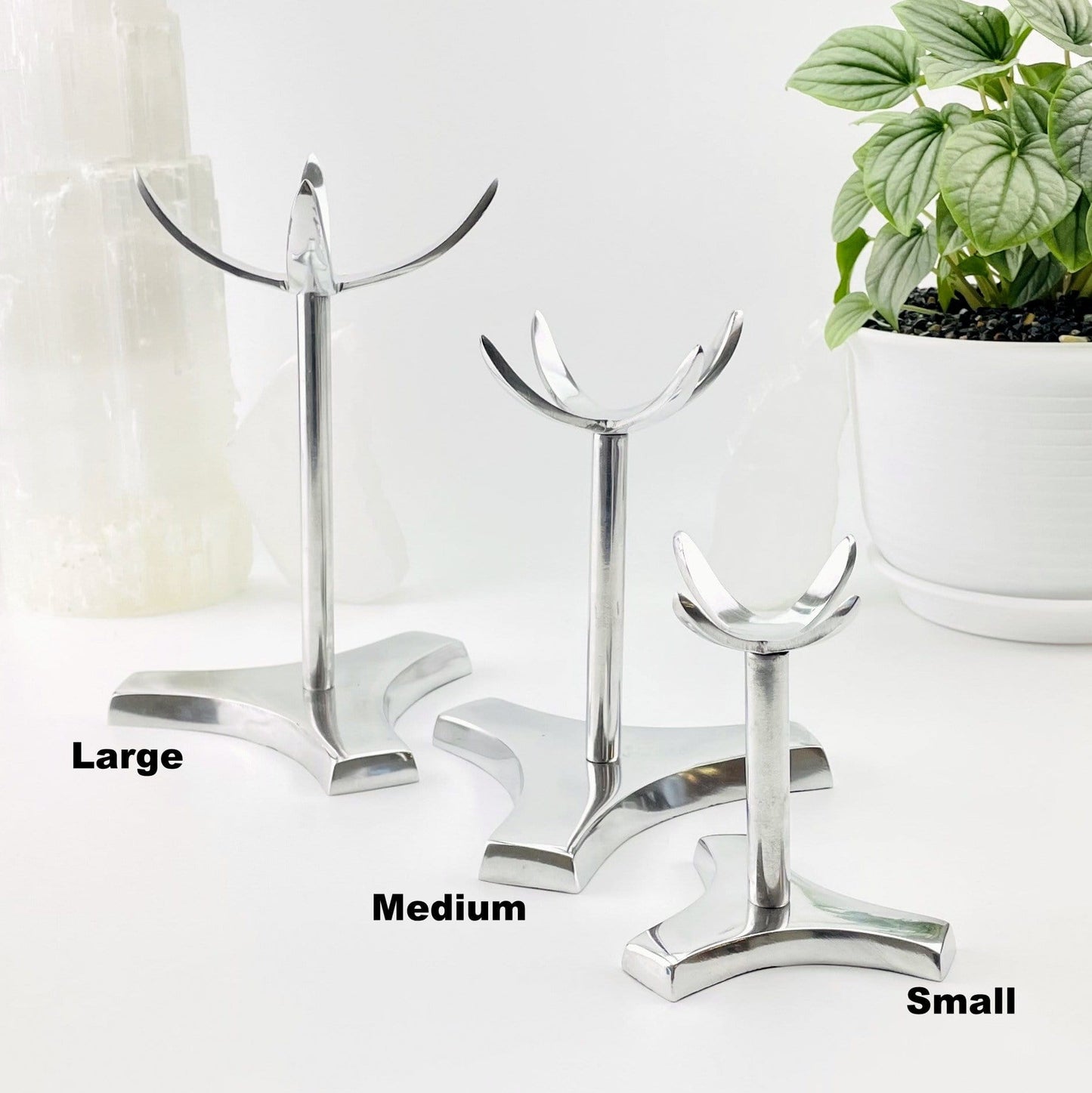 Large, Medium,  and small sphere stands labeled on a white background.