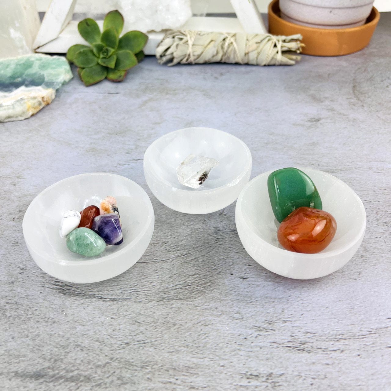 3 Selenite Bowlswith stones inside