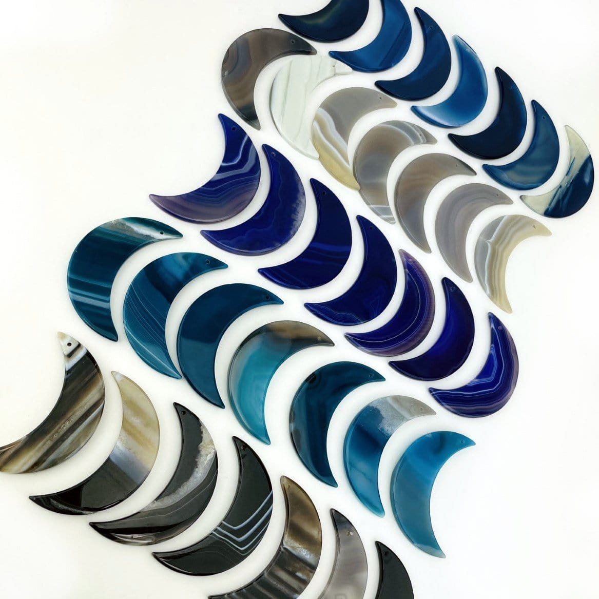 Multiple variations displayed on a white surface, showing variation in color and pattern.
