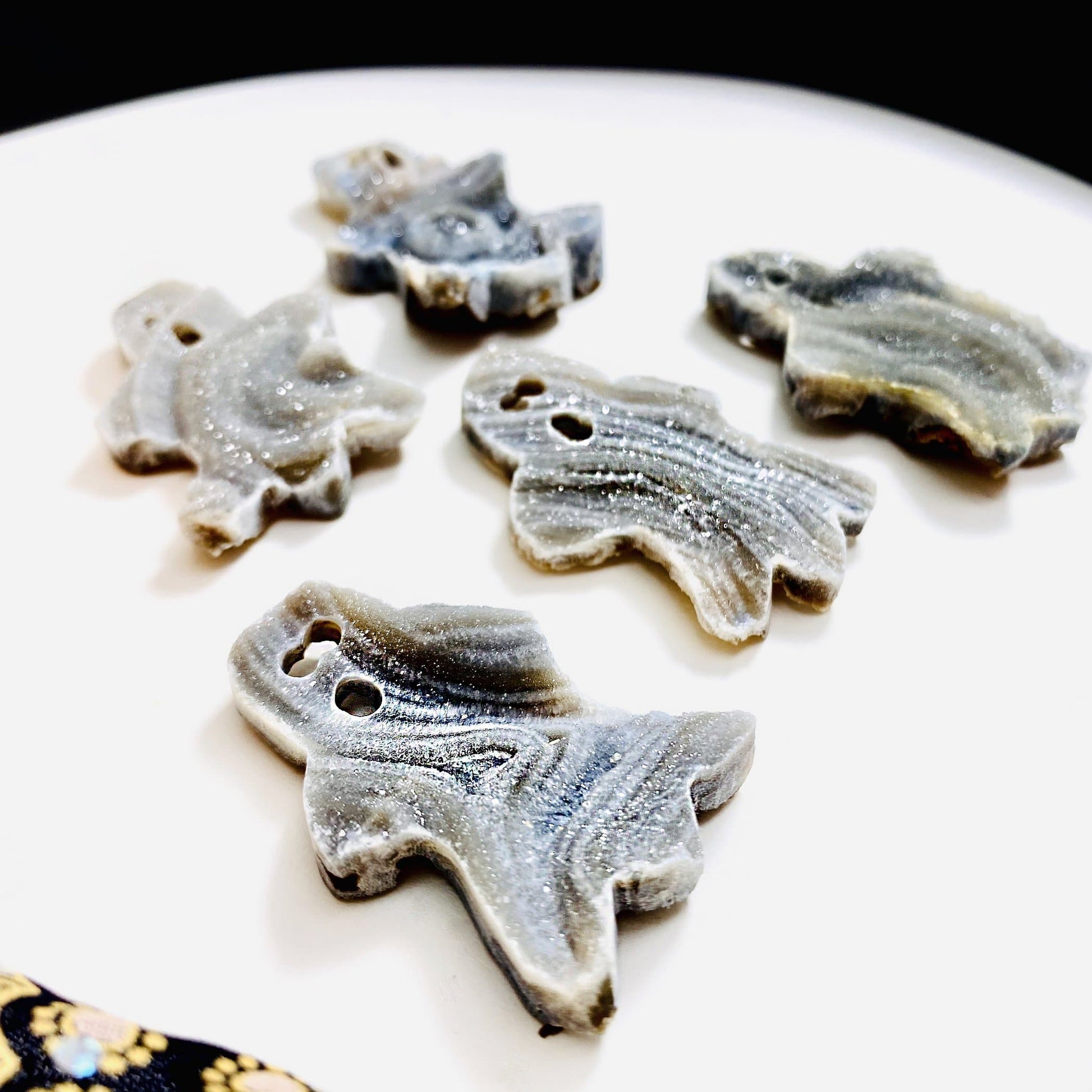 Chalcedony Ghost Cabochons from a side view showing thickness