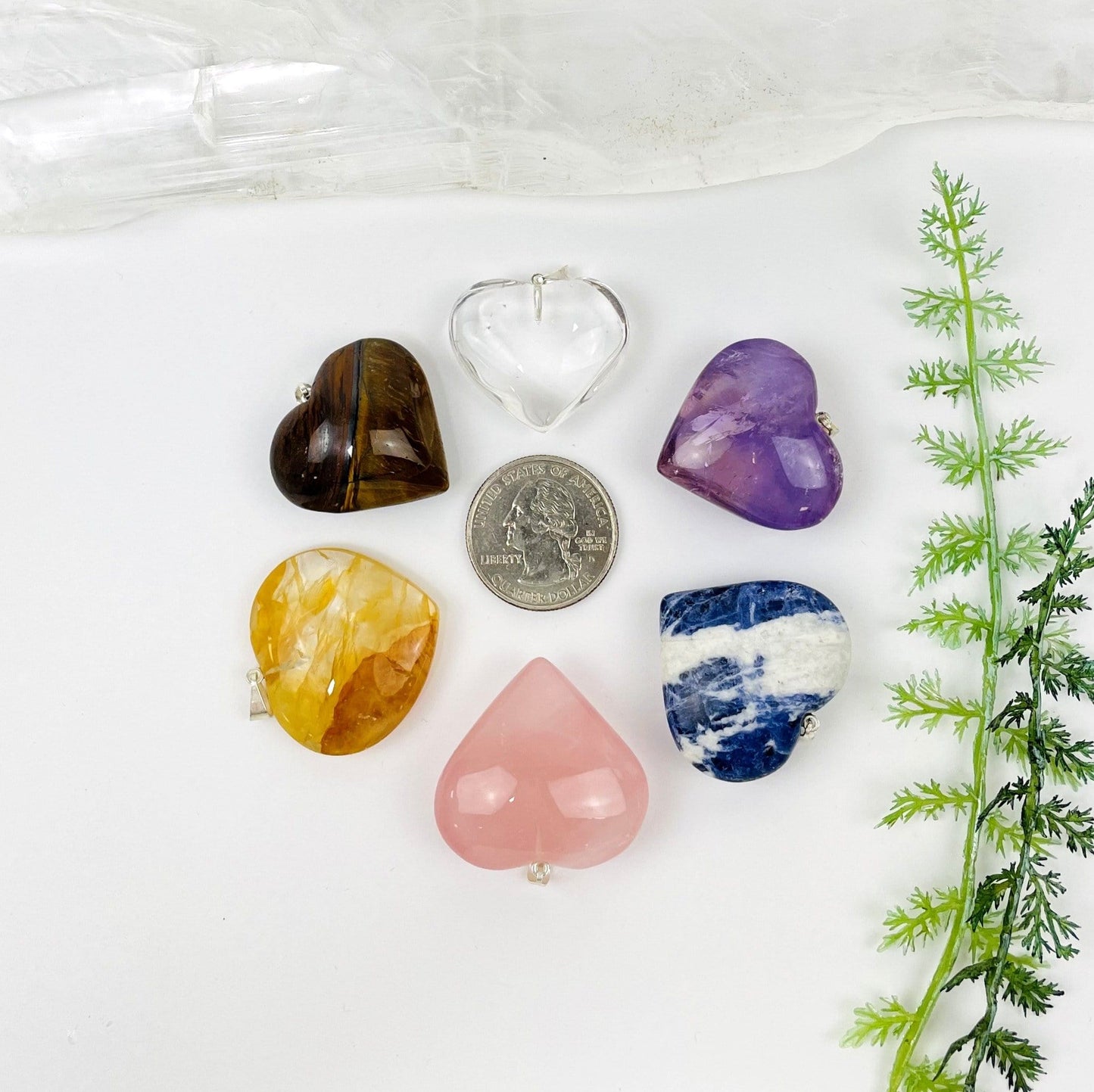 stone hearts around a quarter