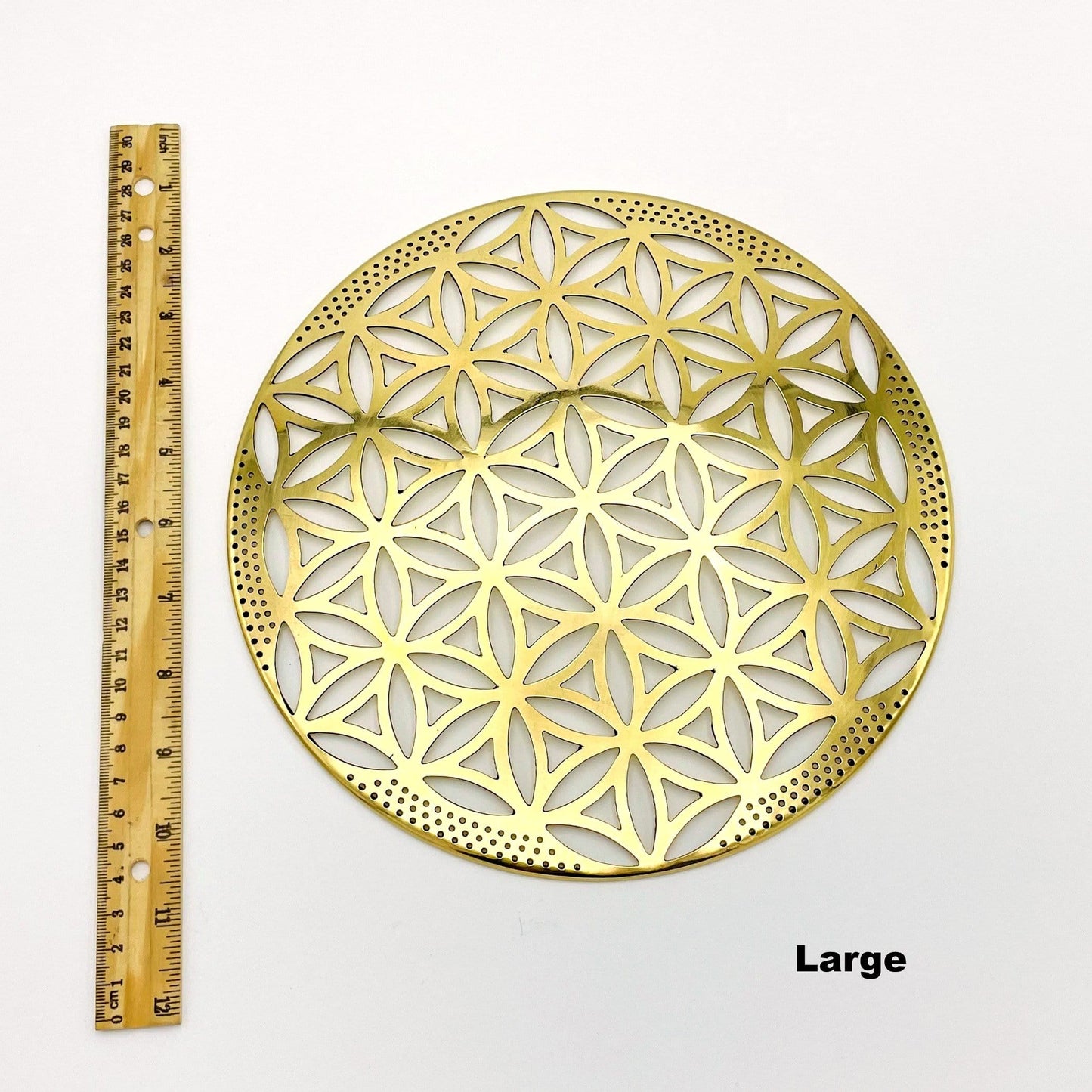 flower of life grid available in large size. displayed next to a ruler for size reference  