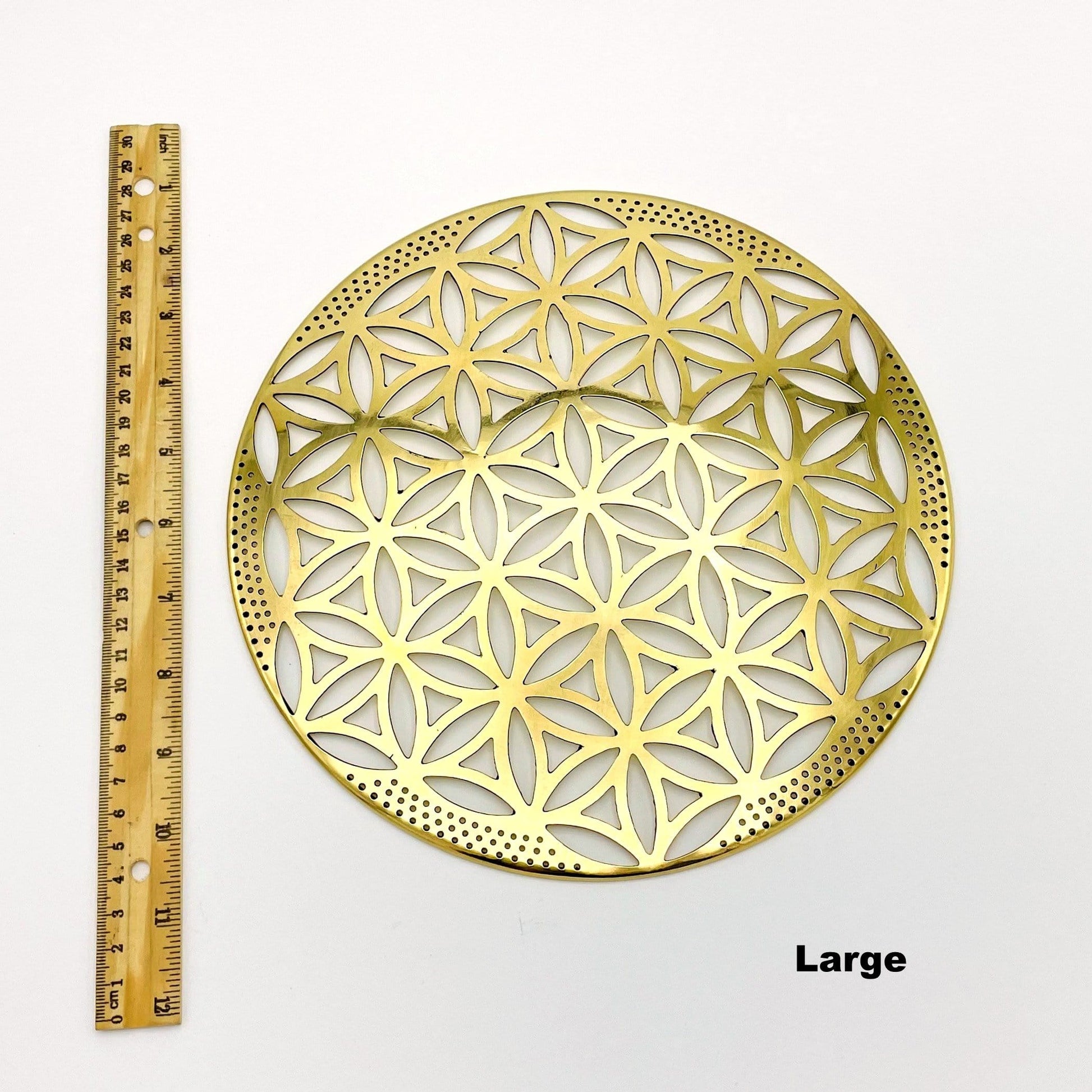flower of life grid available in large size. displayed next to a ruler for size reference  