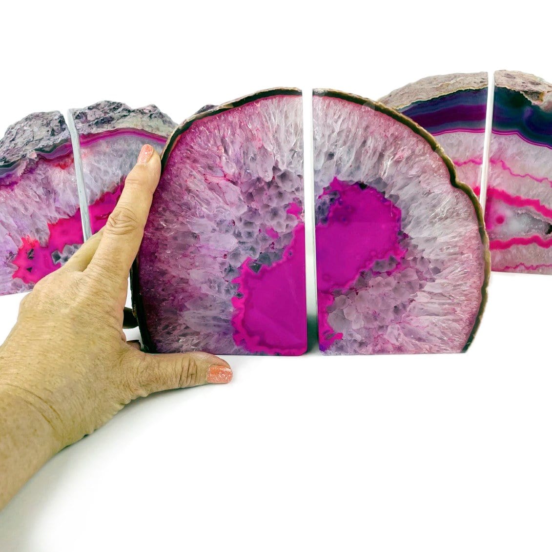Three Pink agate bookend pair on a white background.