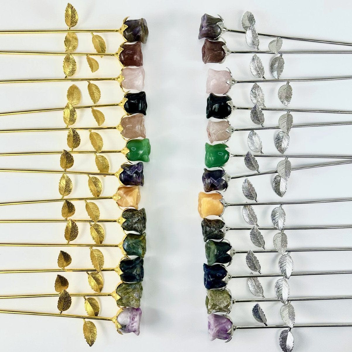 Crystal Rose - Carved Stones laid out on  table showing side view and both the gold and silver stems