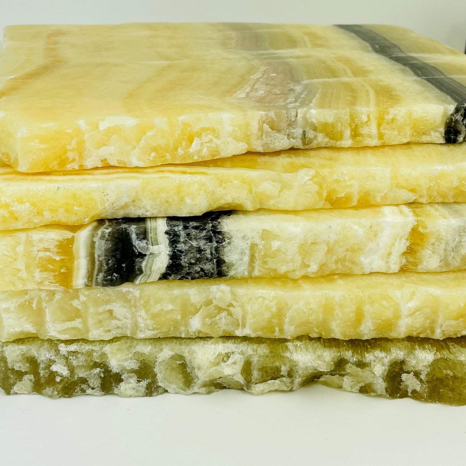 stack of 5 Mexican onyx platters