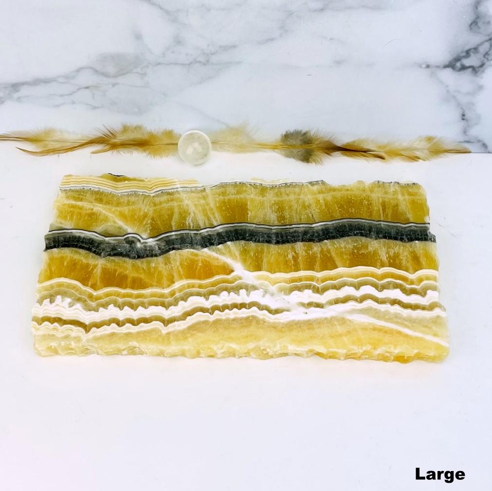  large Mexican onyx platter with decorations in the background