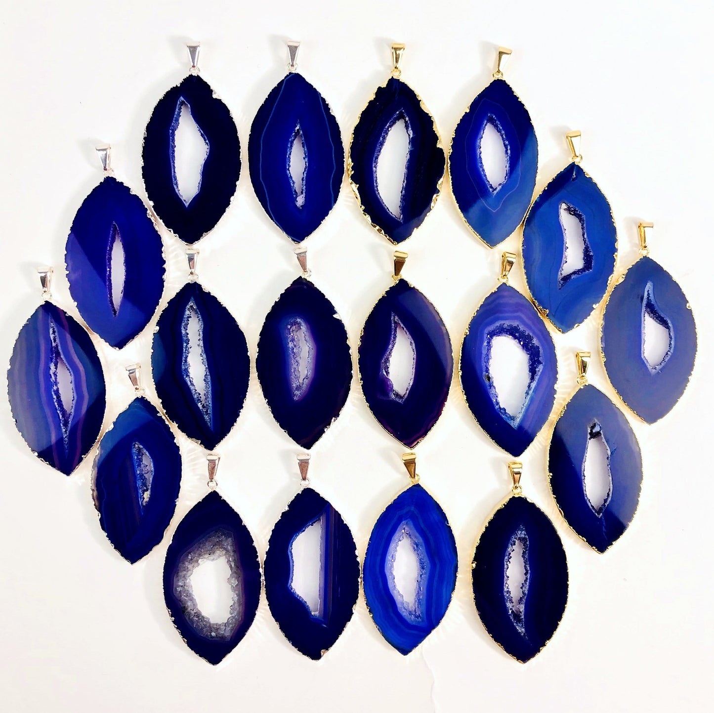 Front facing purple agate druzy marquise shape displaying silver and gold pendants. Color and pattern vary.