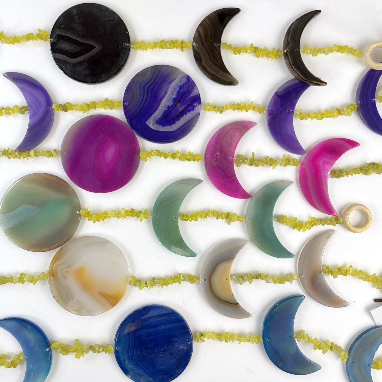 Agate Moon Phase Horizontal Wall Hangings with Yellow Jade Beads up close