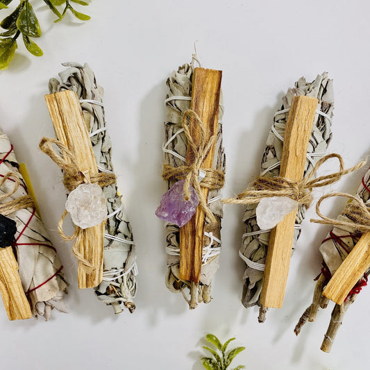 sage palo santo bundles with stone pendant options on display