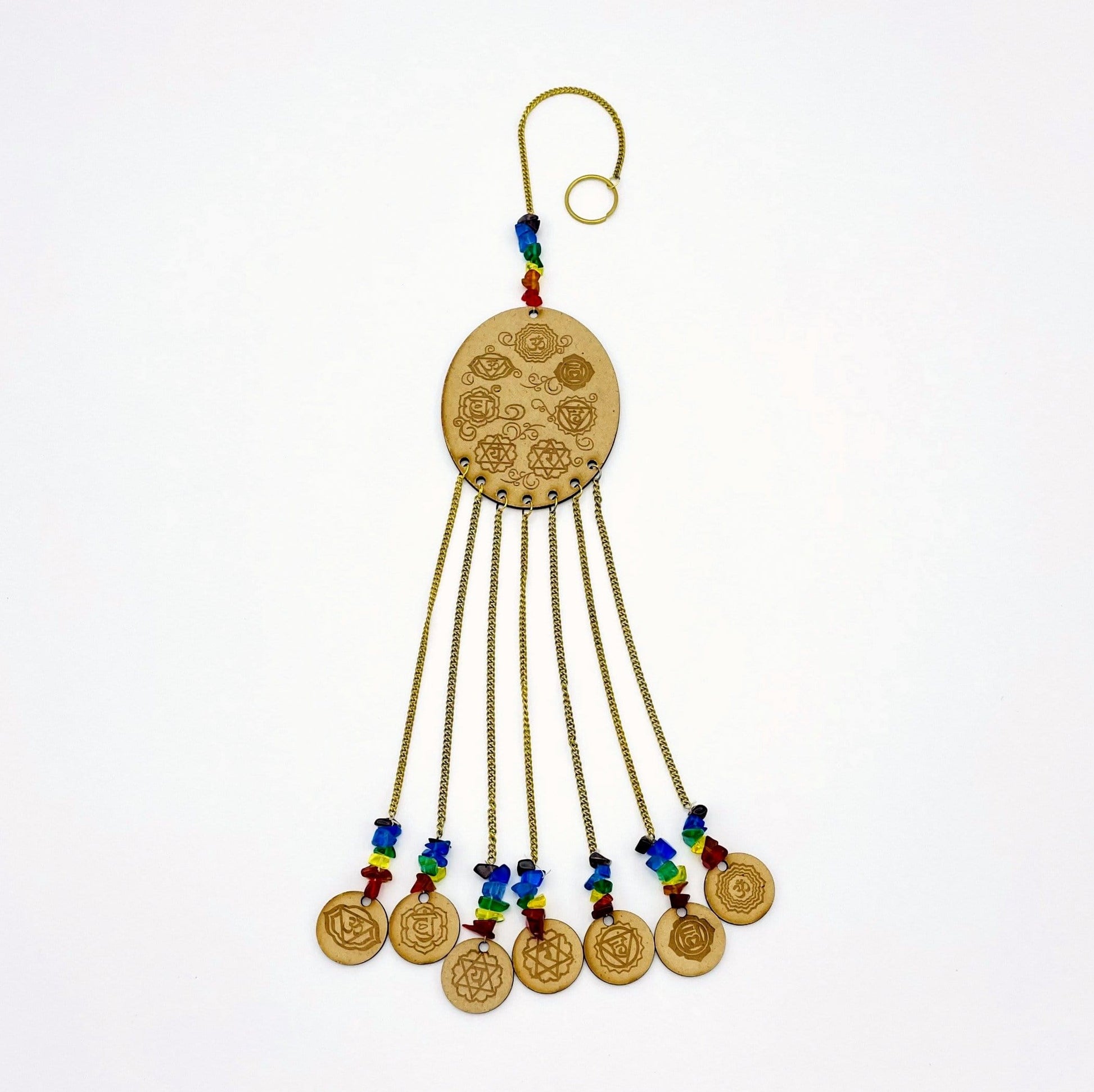 Engraved Wooden 7 Chakras on white background 