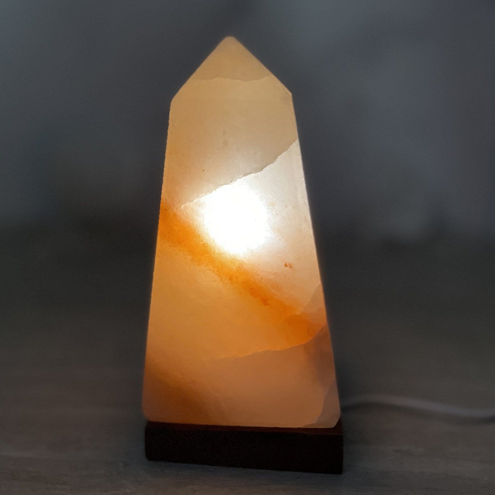 salt lamp turned on to show how it illuminates 