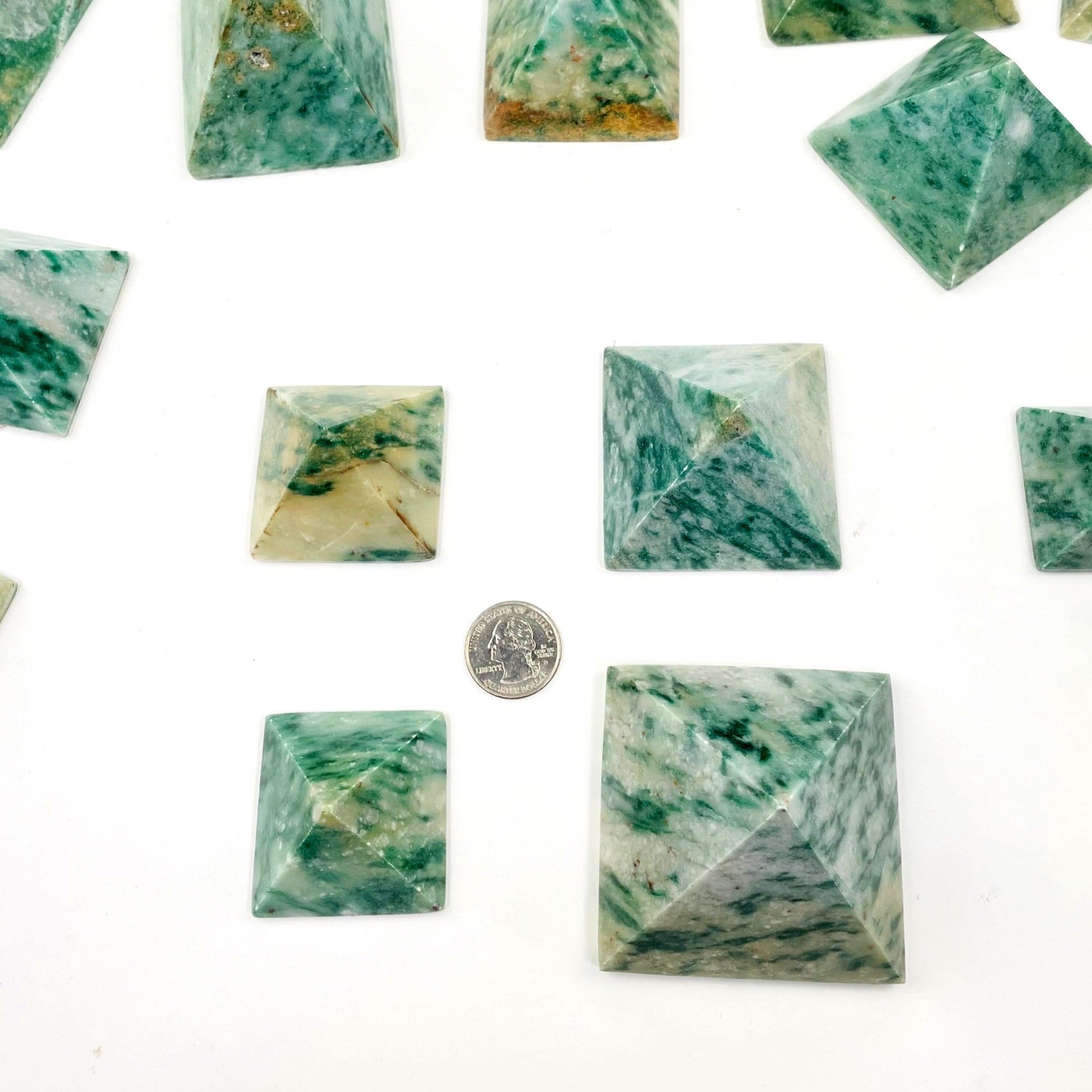 pyramids next to a quarter for size reference 