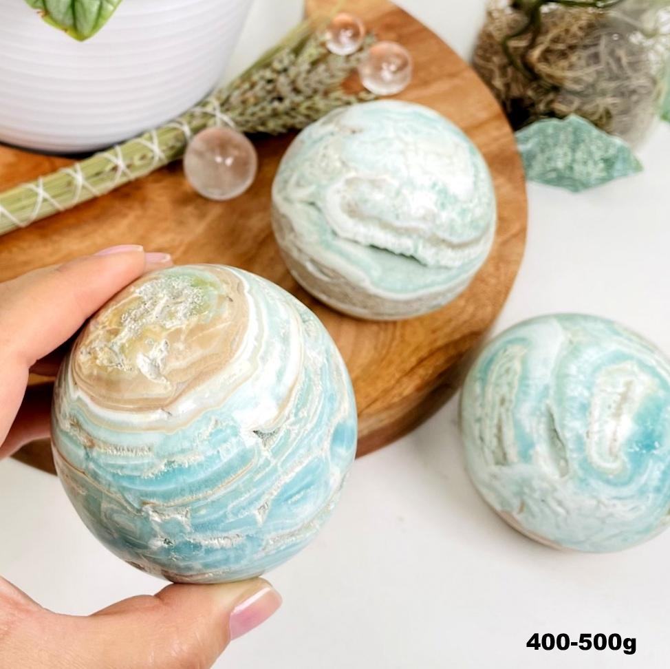 Blue Aragonite Spheres - Also known as Caribbean Calcite, showing sample of markings of the stock available
