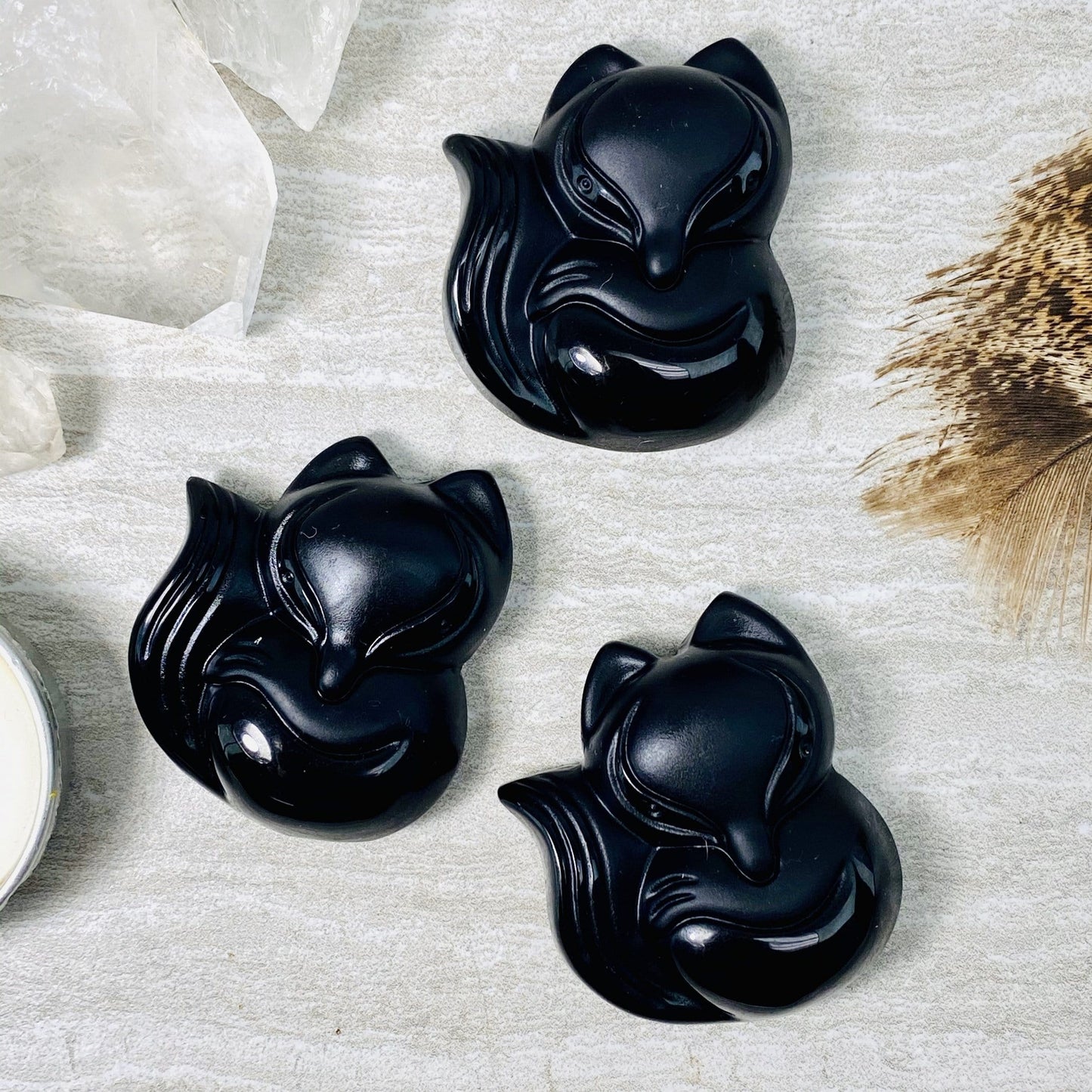 black onyx fox beads - 3 on a table