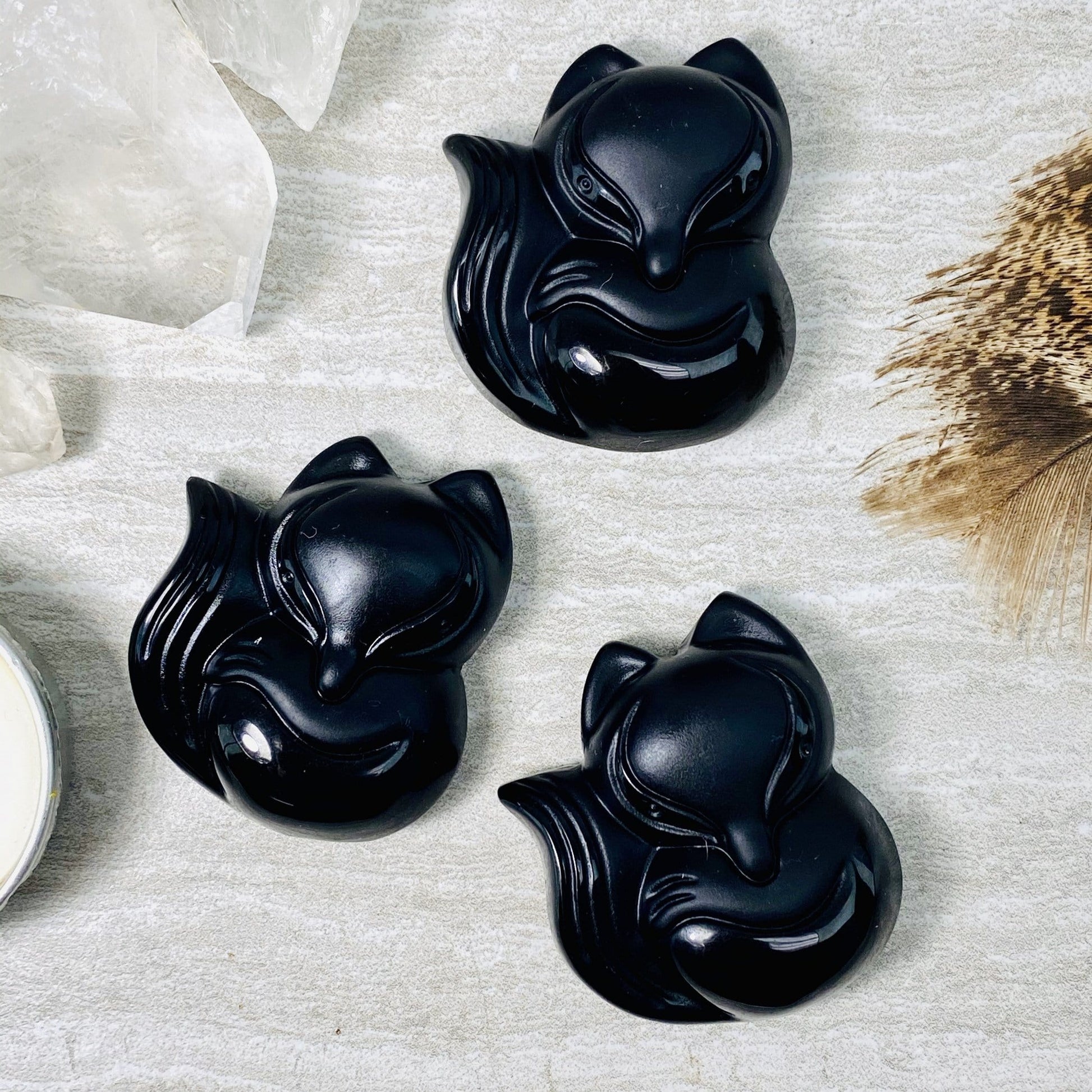 black onyx fox beads - 3 on a table