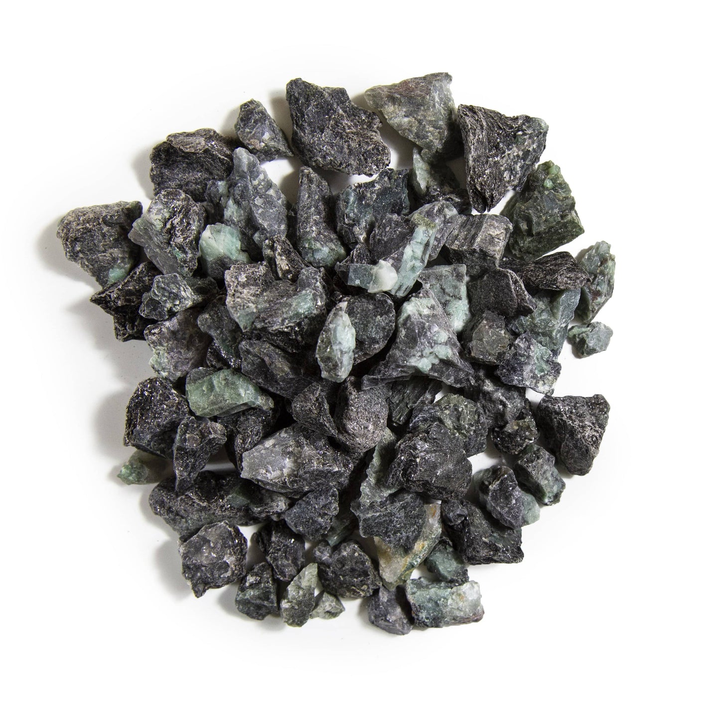 Multiple Emerald Rough Stones on white background.